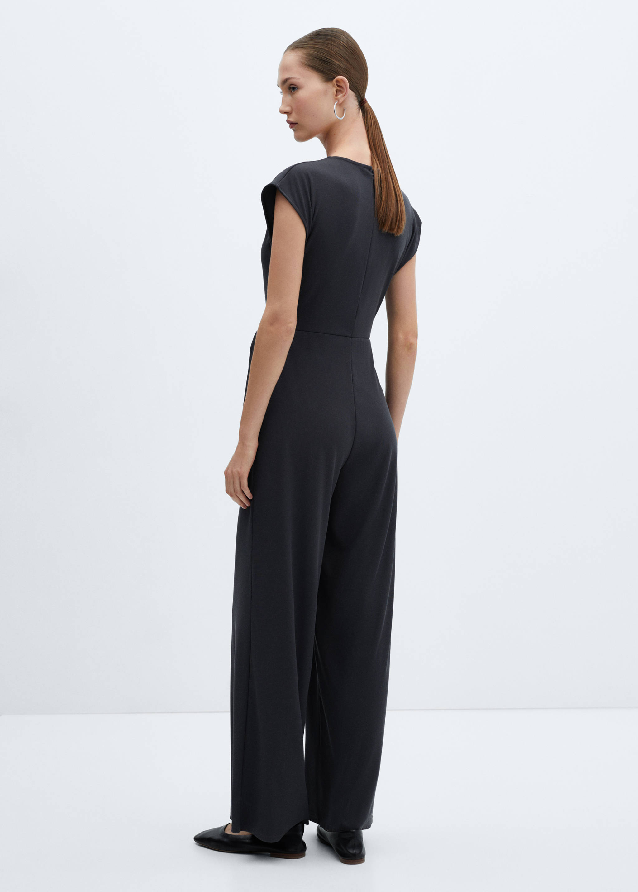 Bow long jumpsuit - Reverse of the article