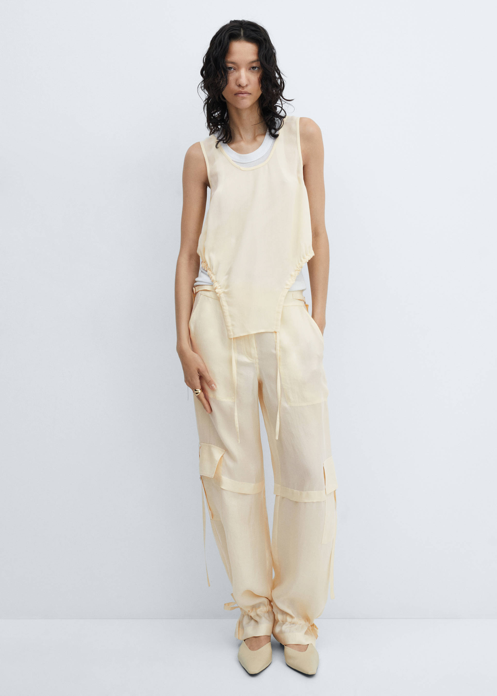 Semi-transparent top with side pleats - General plane