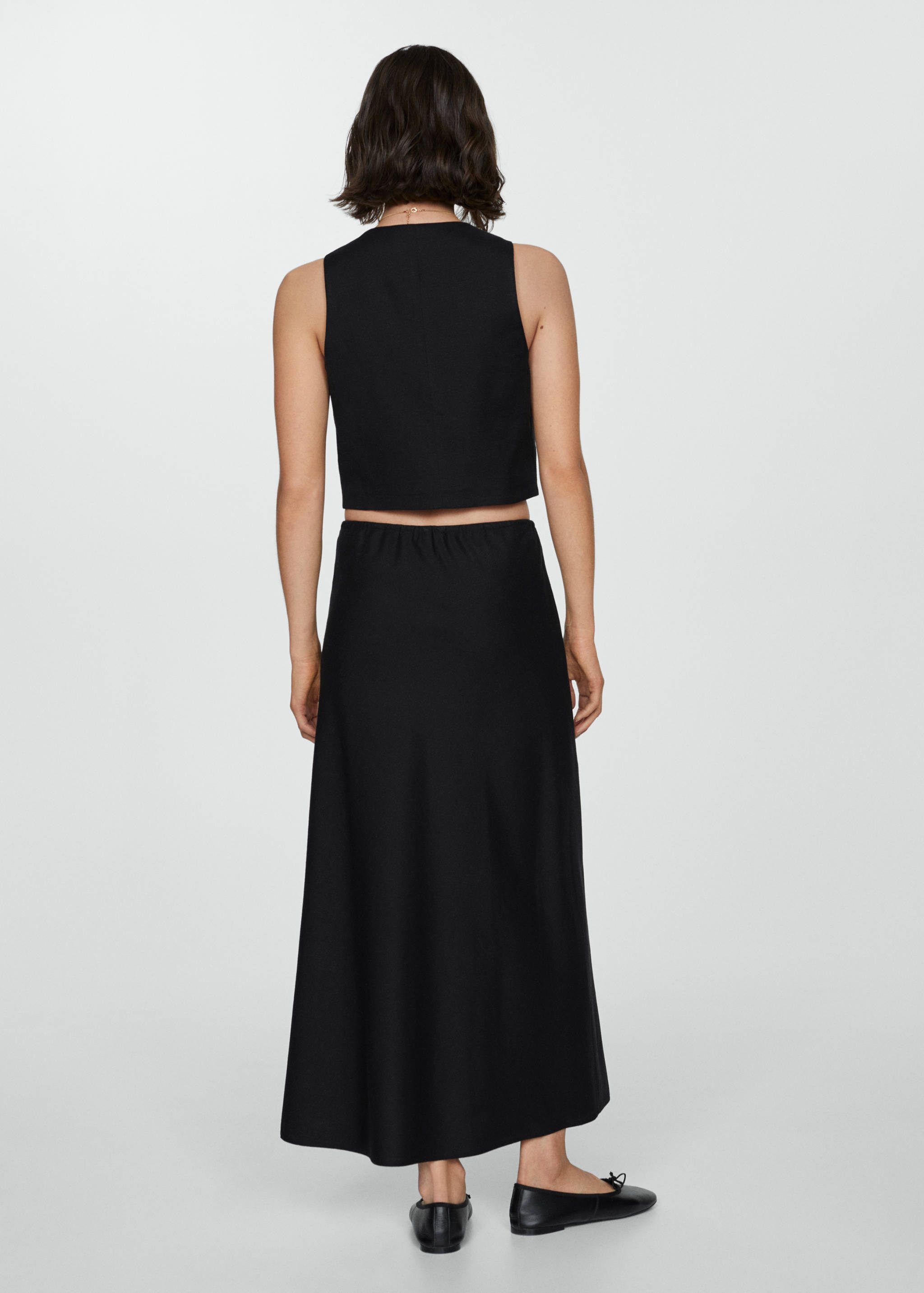 Long skirt with adjustable bow - Reverse of the article