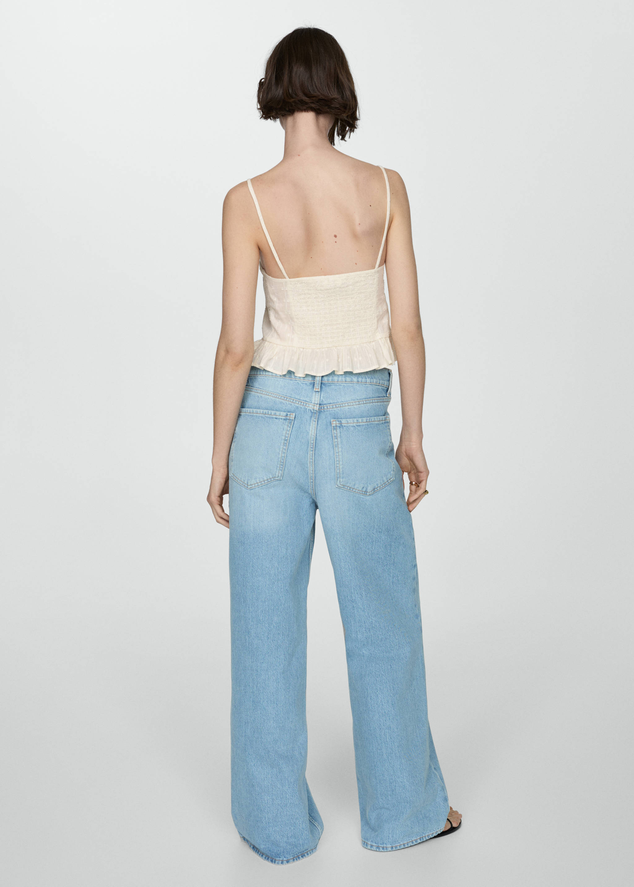 Ruffled top with embroidered details - Reverse of the article