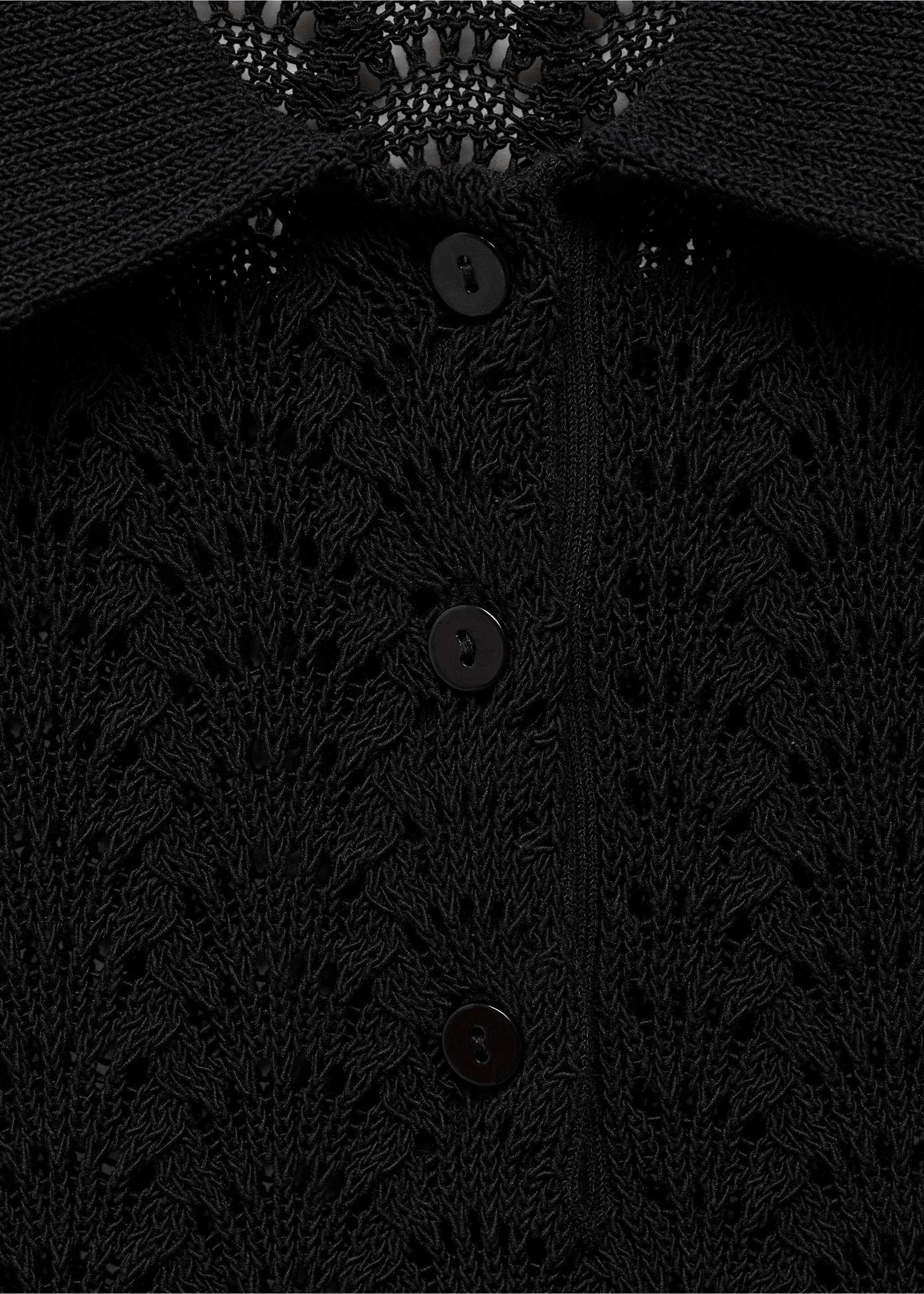 Pull-over crochet col polo - Détail de l'article 8, Noir. Ref: 67058651-00.