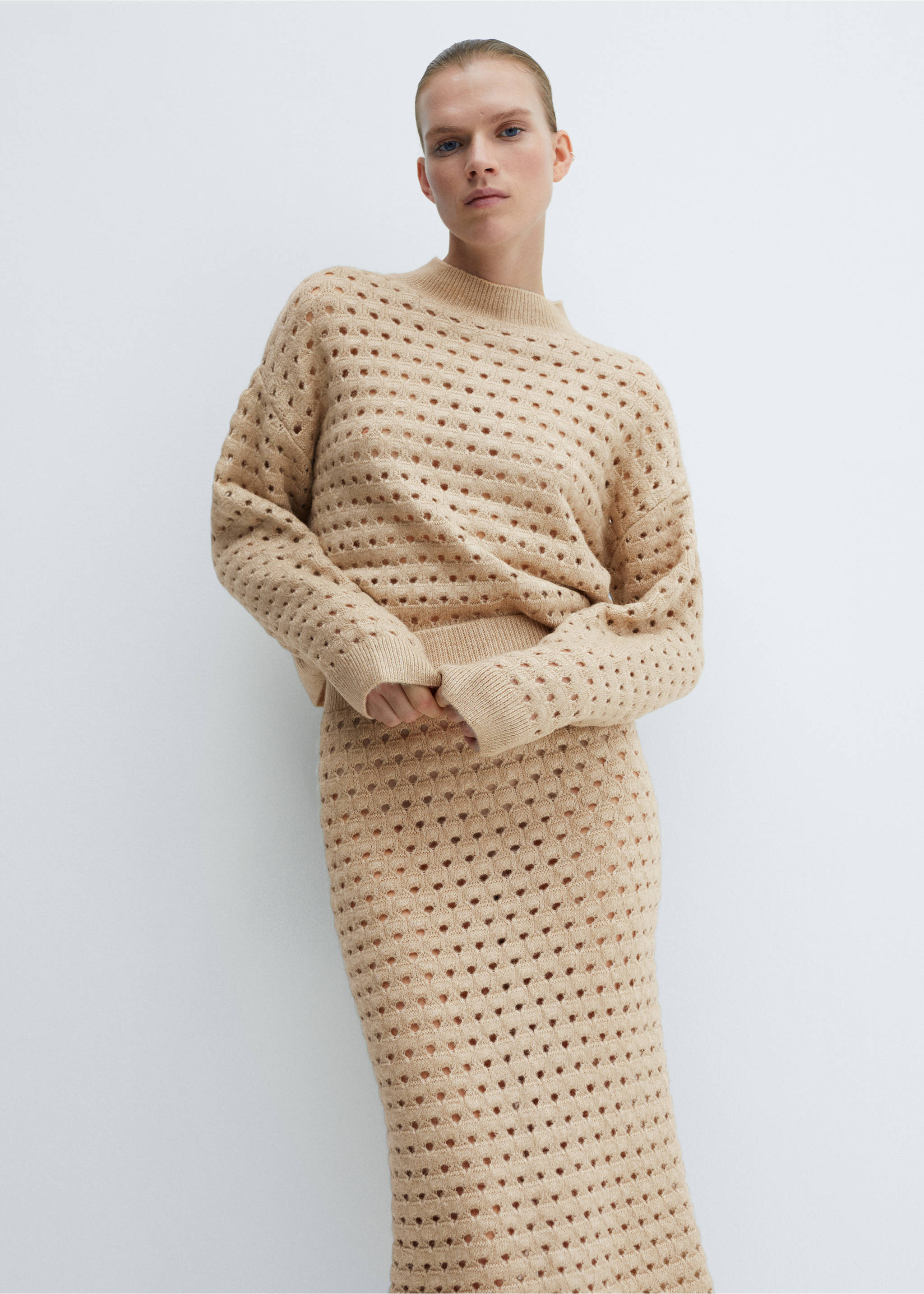 Knitted skirt with openwork details - Details of the article 1, Light/Pastel Grey. Ref: 67060479-00.