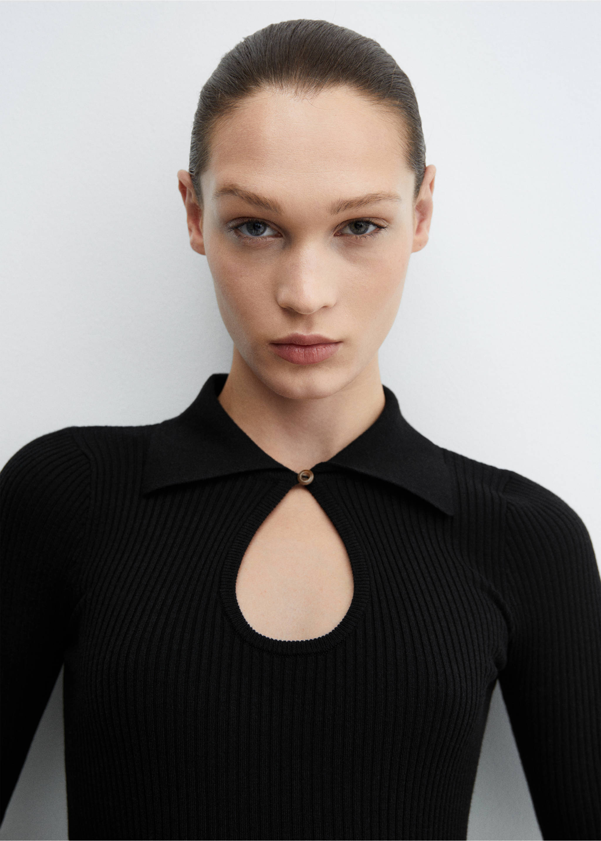 Ribbed knit dress with opening - Details of the article 1, Black. Ref: 67063264-00.