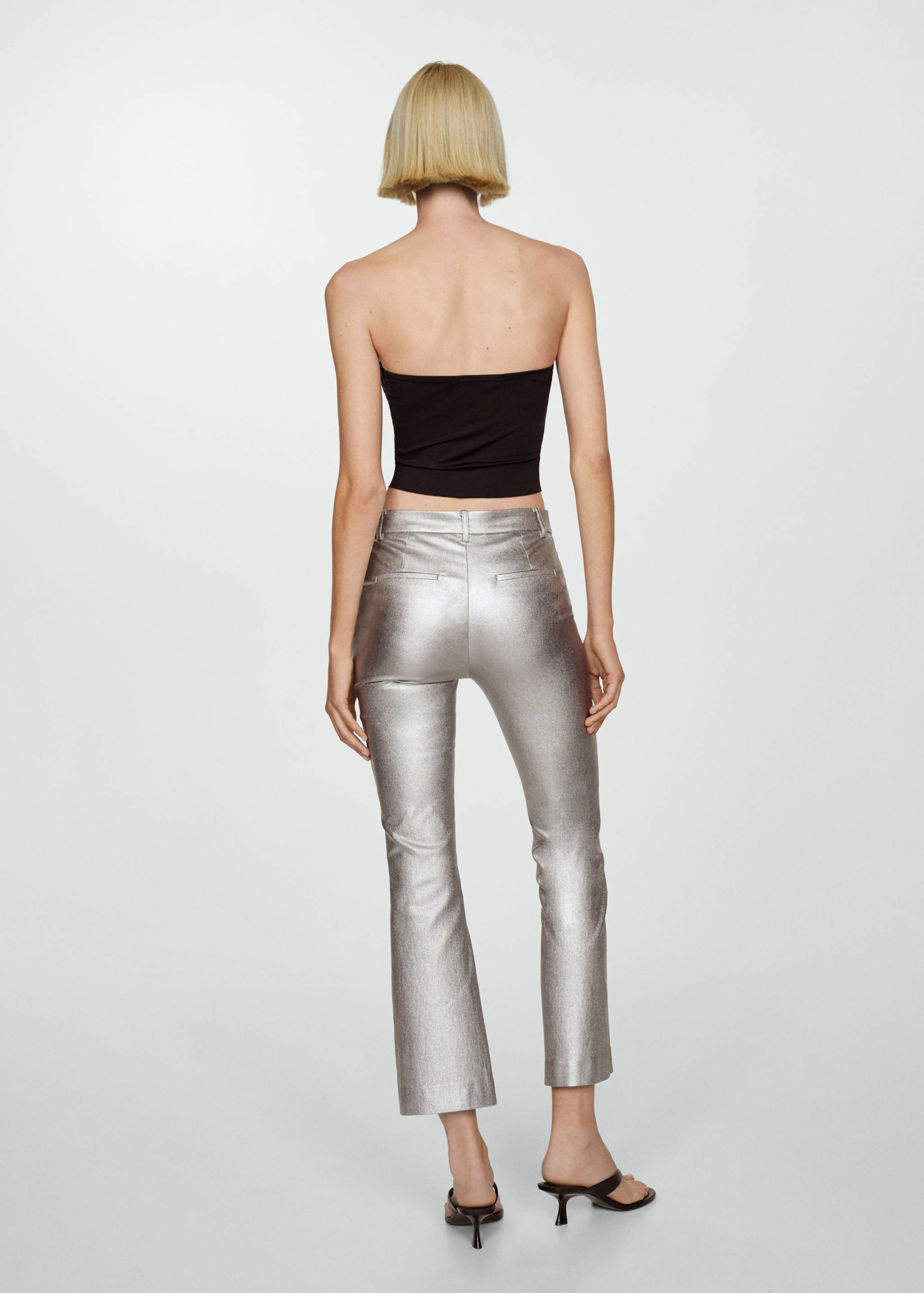 Pantalons flare metal·litzats - Revers de l'article