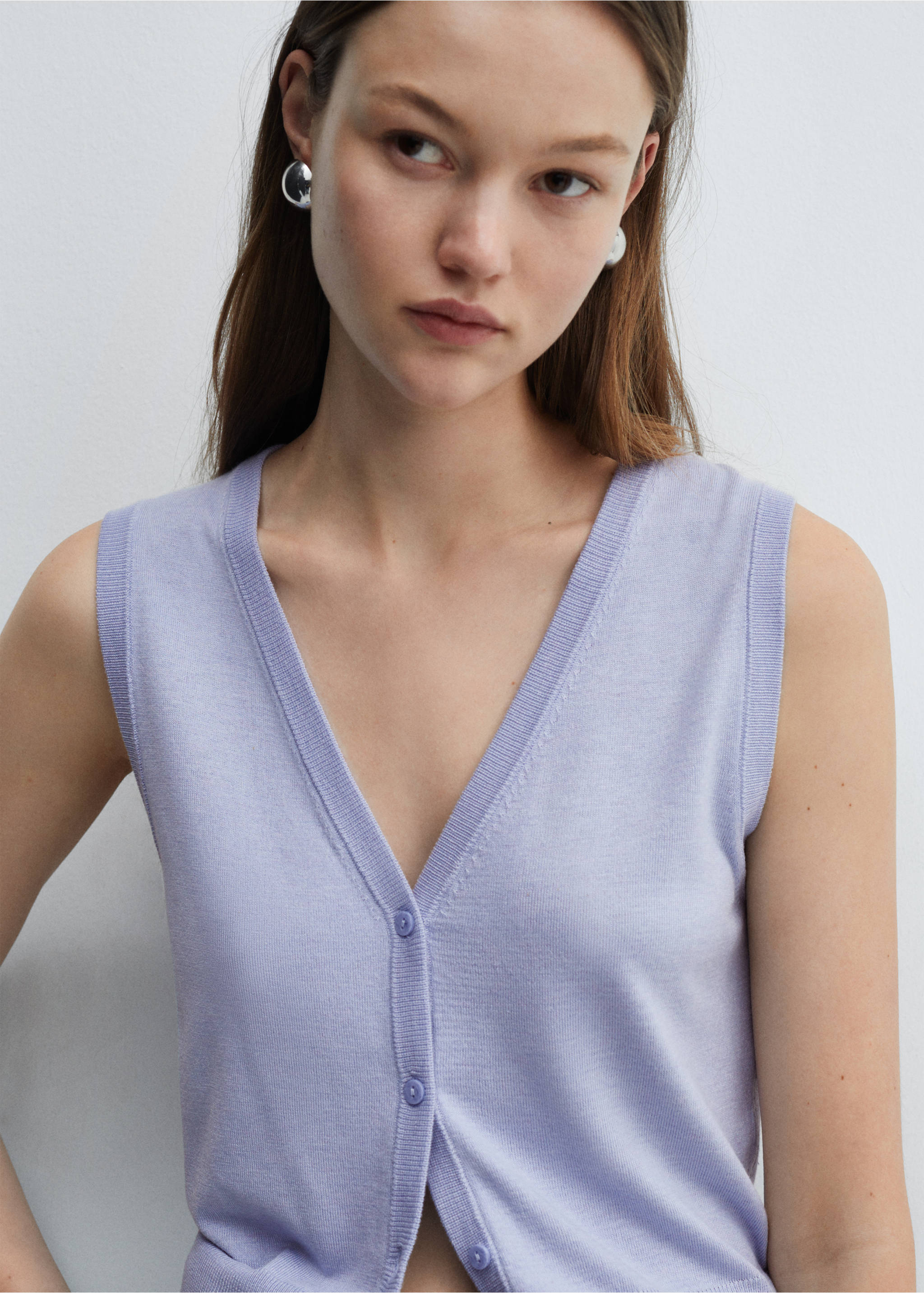 Knitted gilet with buttons - Details of the article 1, Sky Blue. Ref: 67065739-00.
