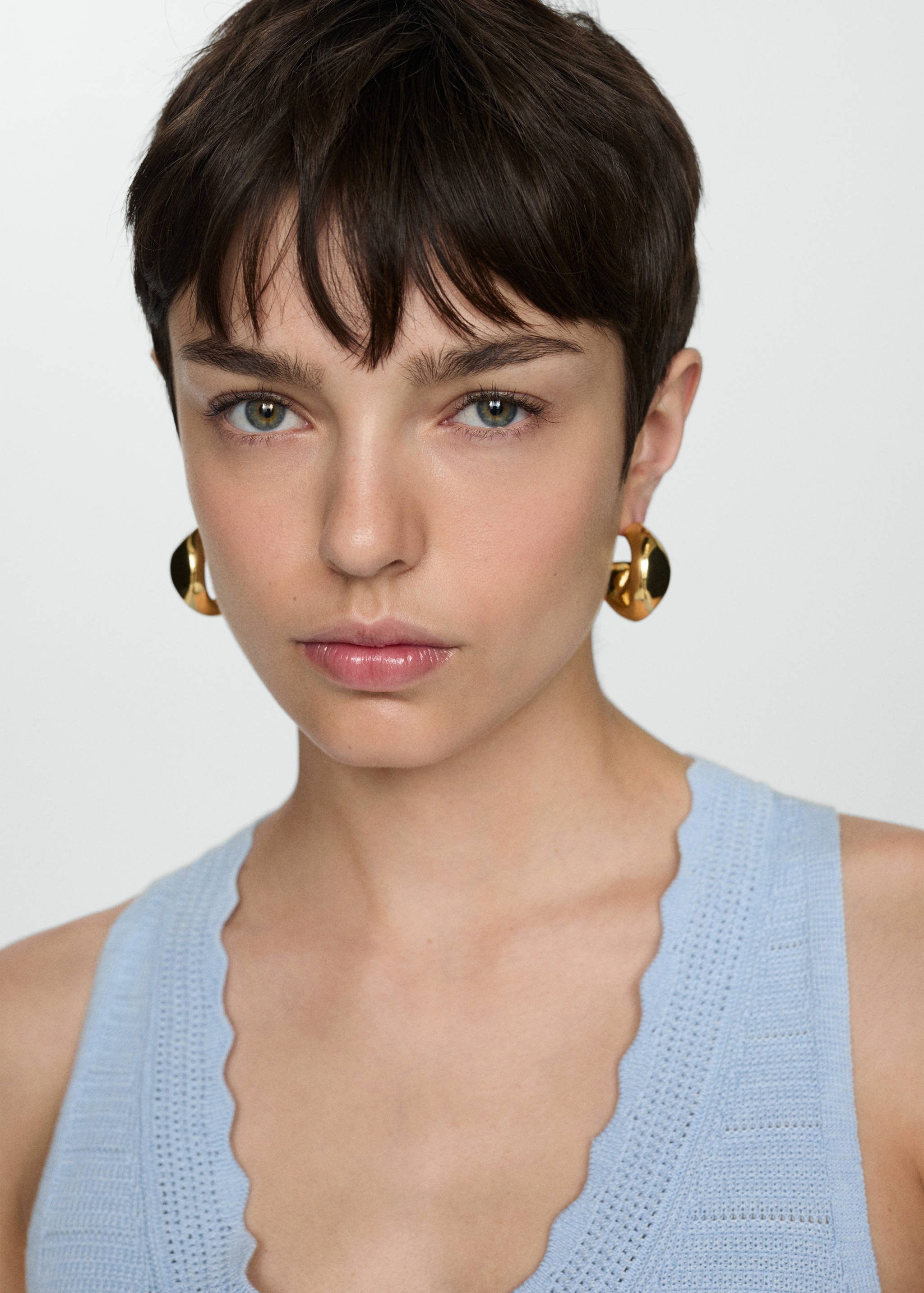 Strickweste mit Lochmusterdetails - Detail des Artikels 1