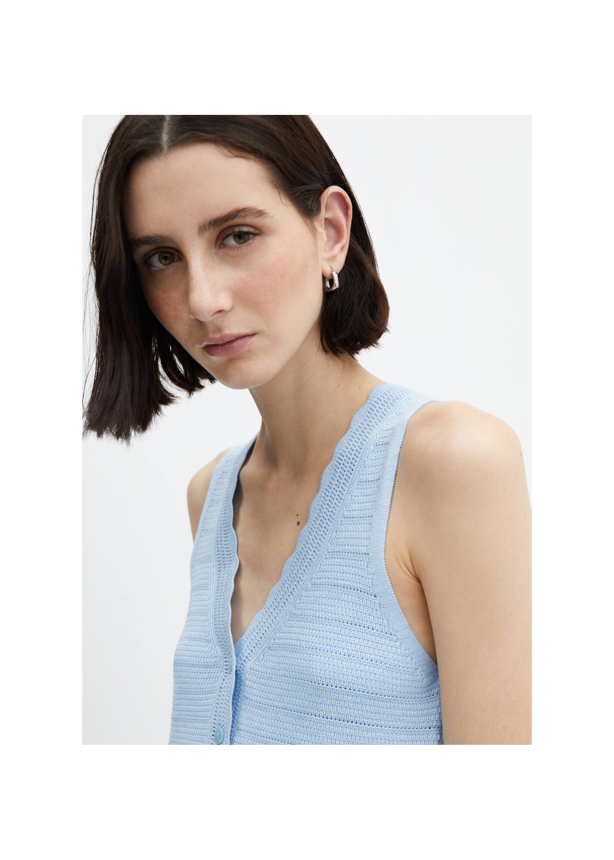 Knitted gilet with openwork details - Details of the article 3, Sky Blue. Ref: 67067133-00.