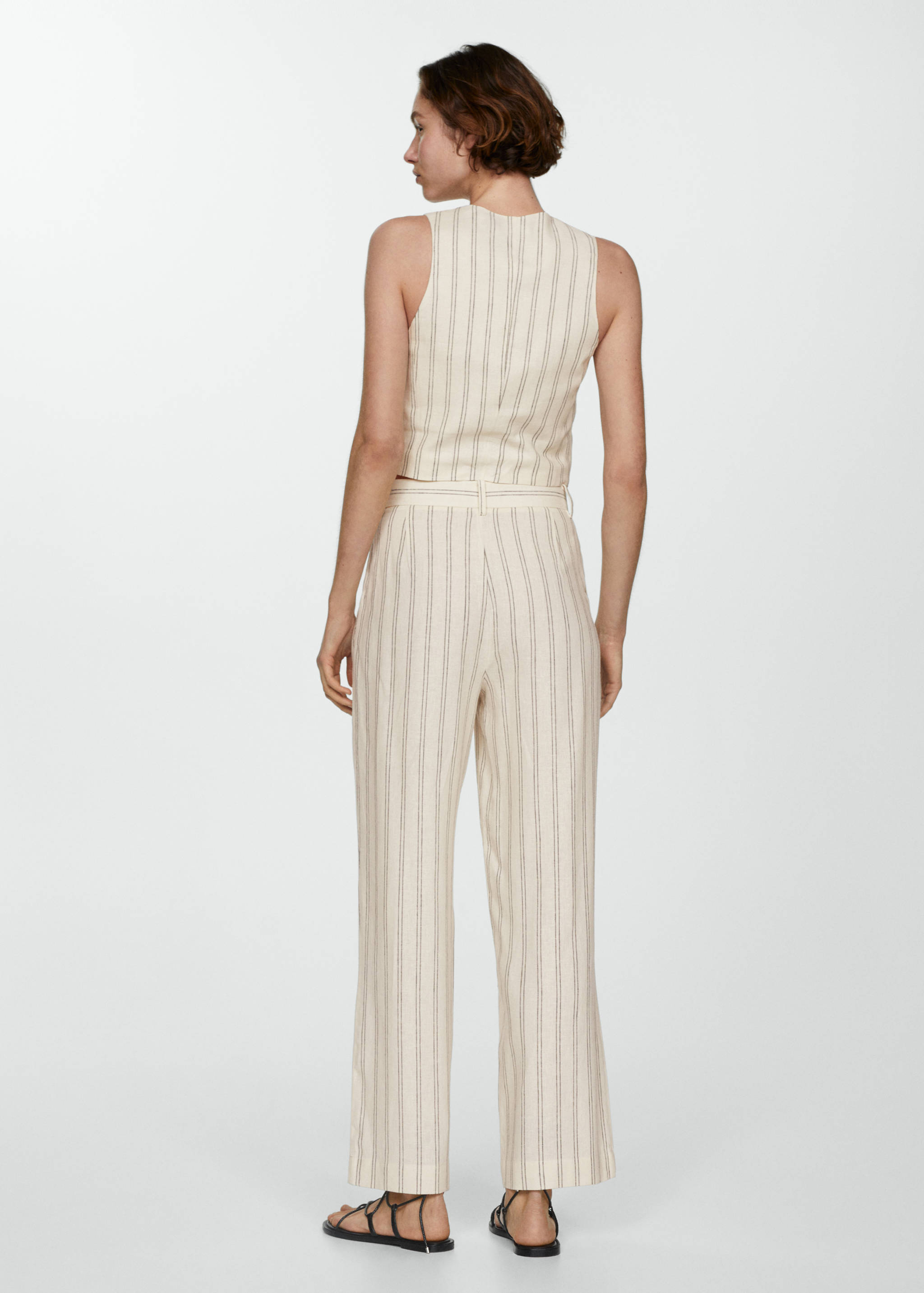 Льняные брюки в полоску - Обратная сторона изделия