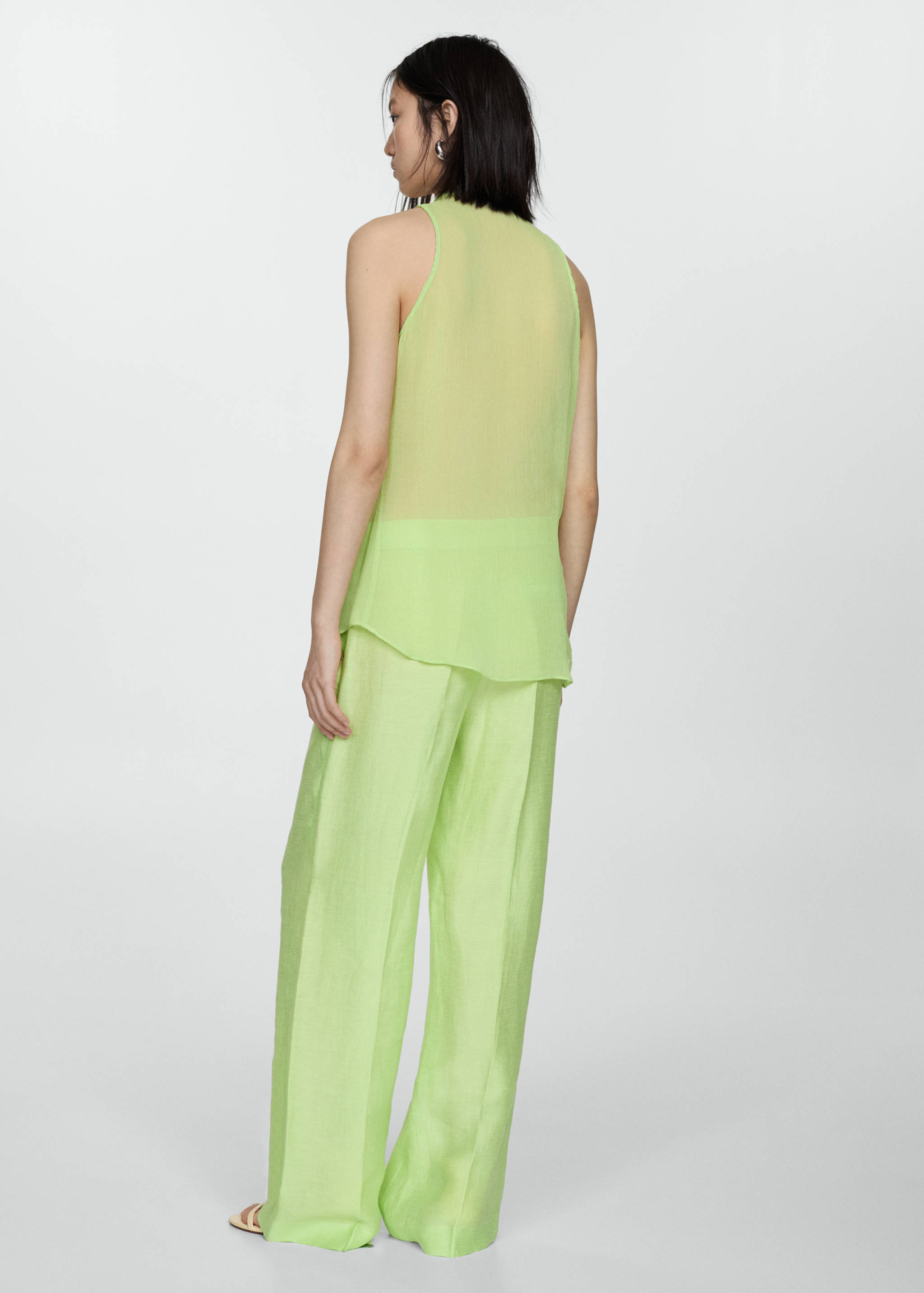 Blusa semitransparente volantes - Reverso del artículo