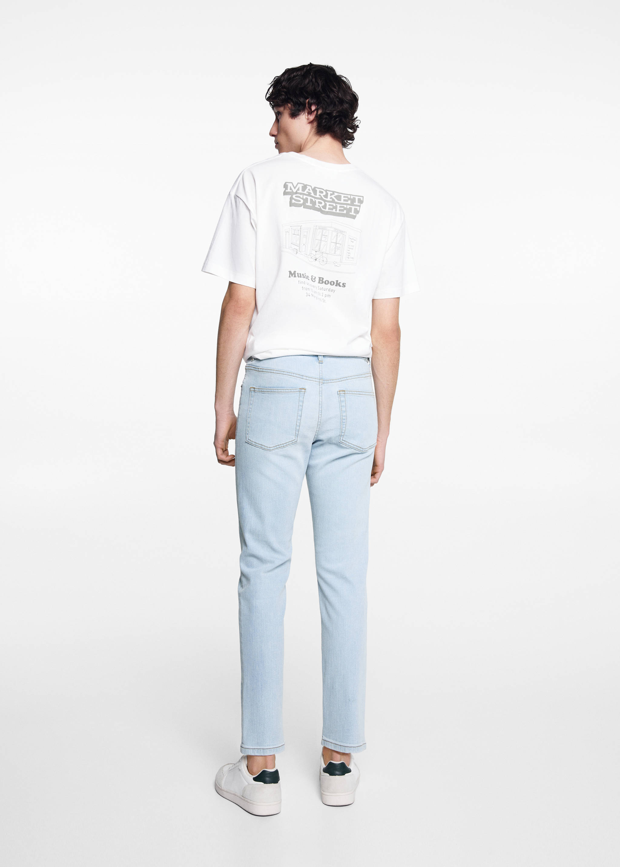 Slim-fit jeans with buttons - Reverse of the article