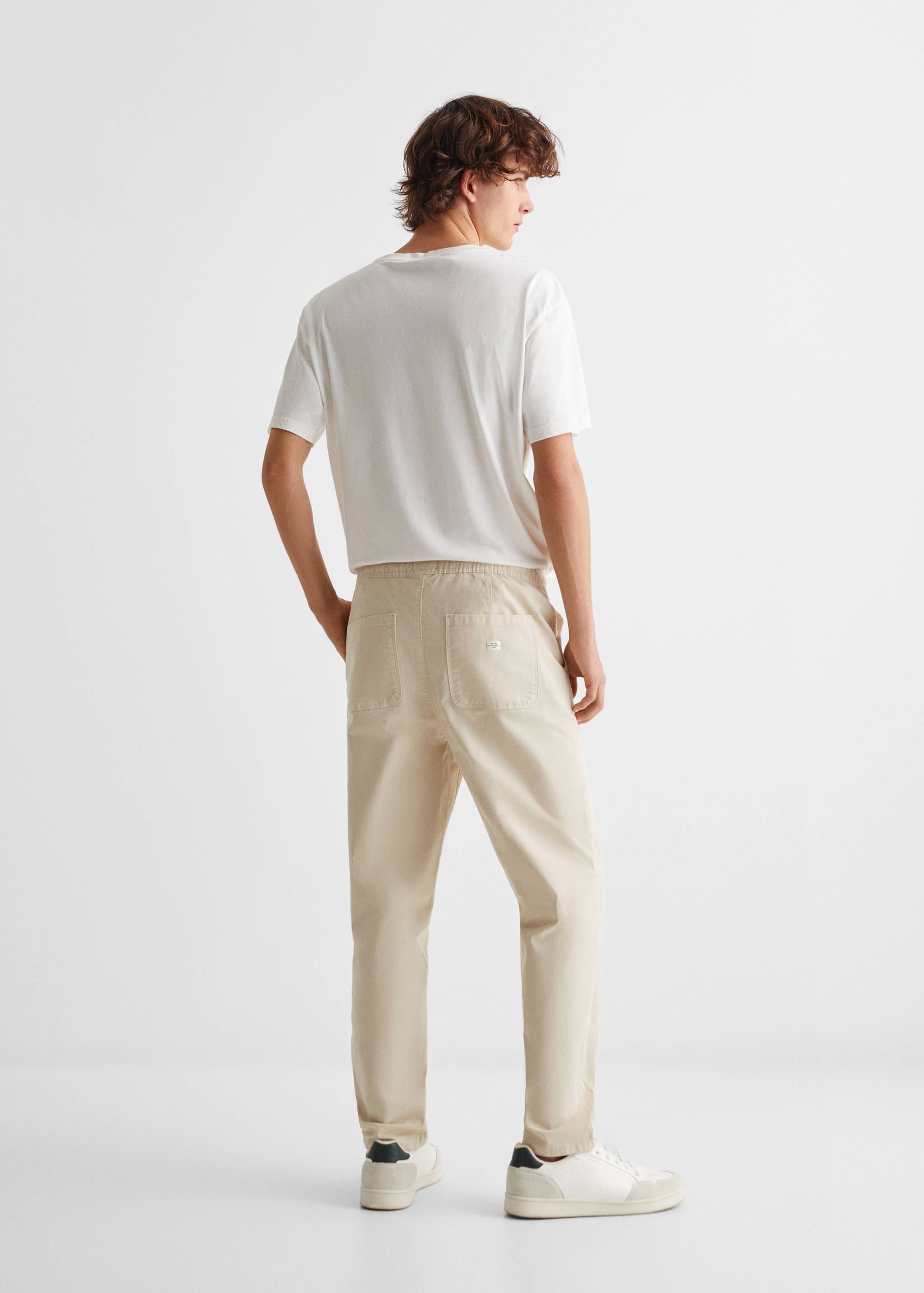 Straight-fit trousers with elastic waist - Reverse of the article