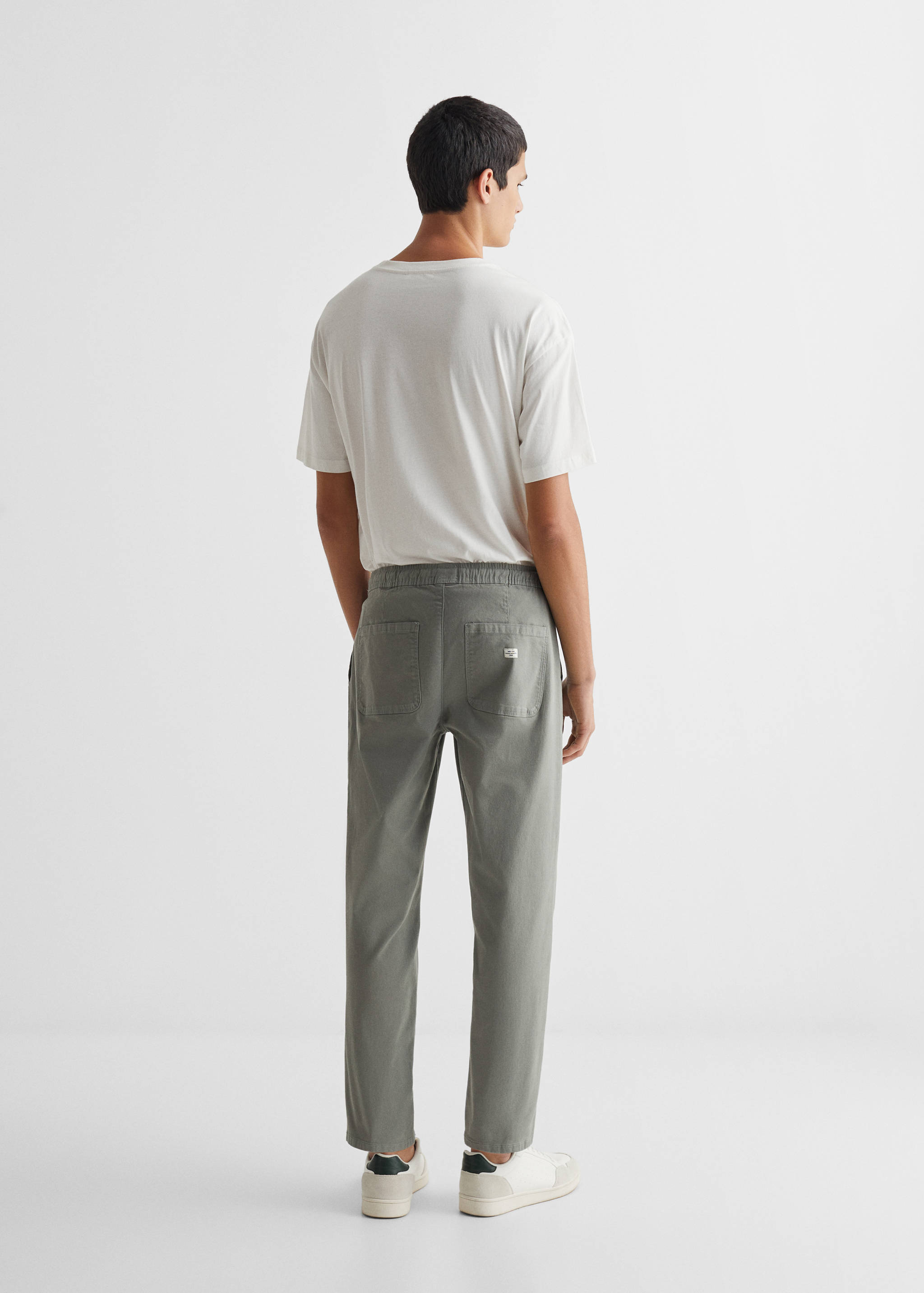 Straight-fit trousers with elastic waist - Reverse of the article
