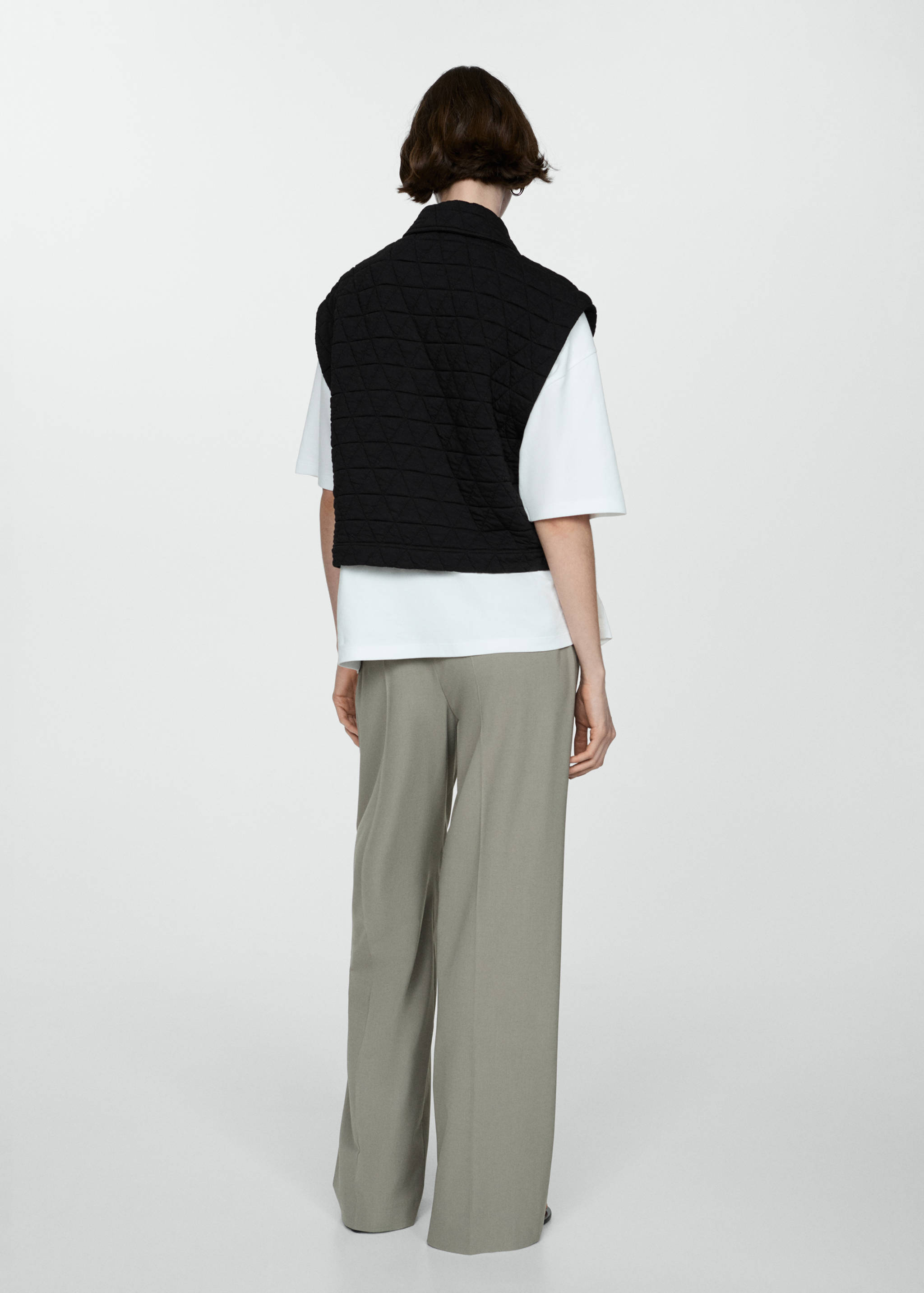 Quilted gilet with buttons - Reverse of the article