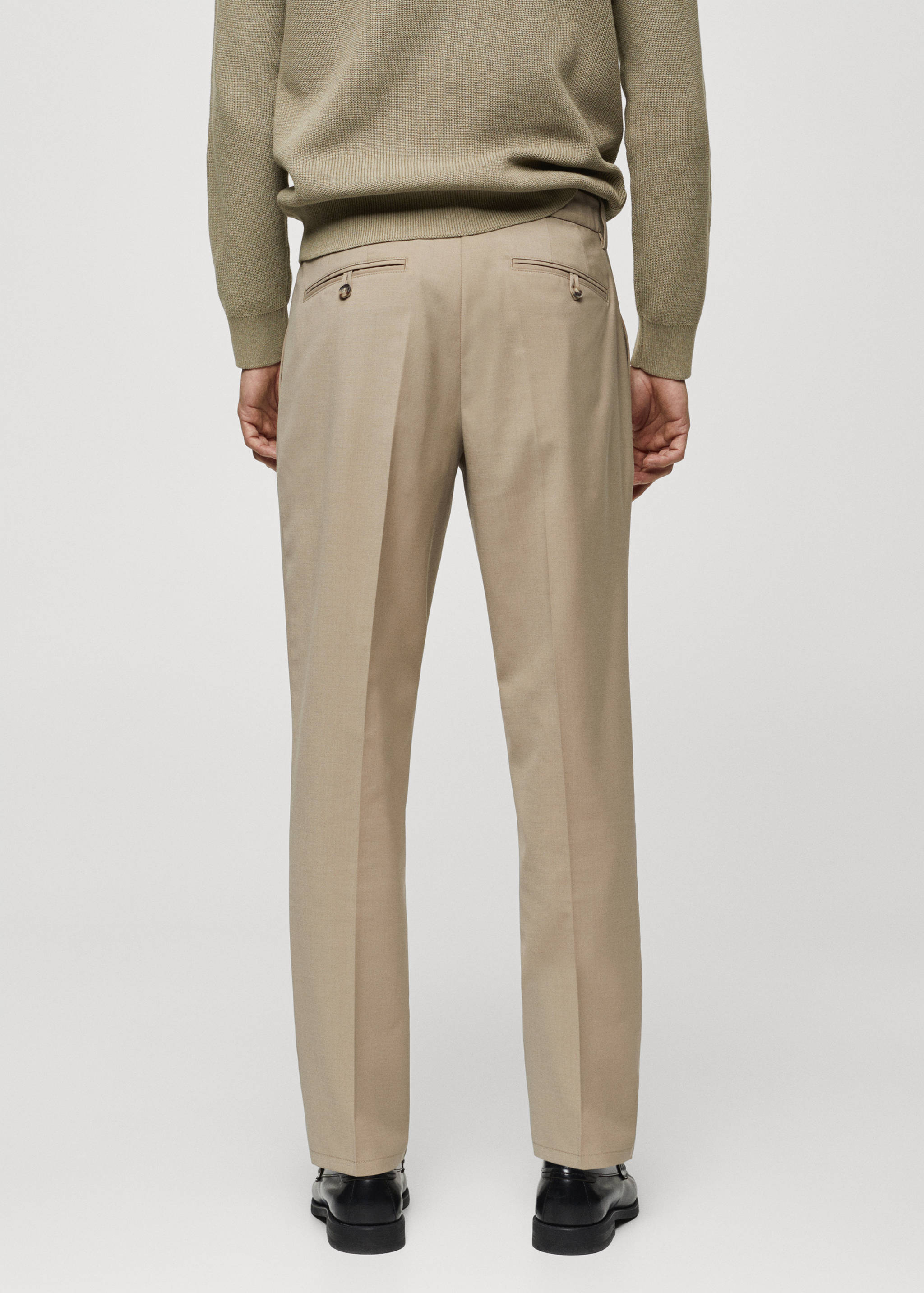 Cold wool pants with pleat detail - Reverse of the article