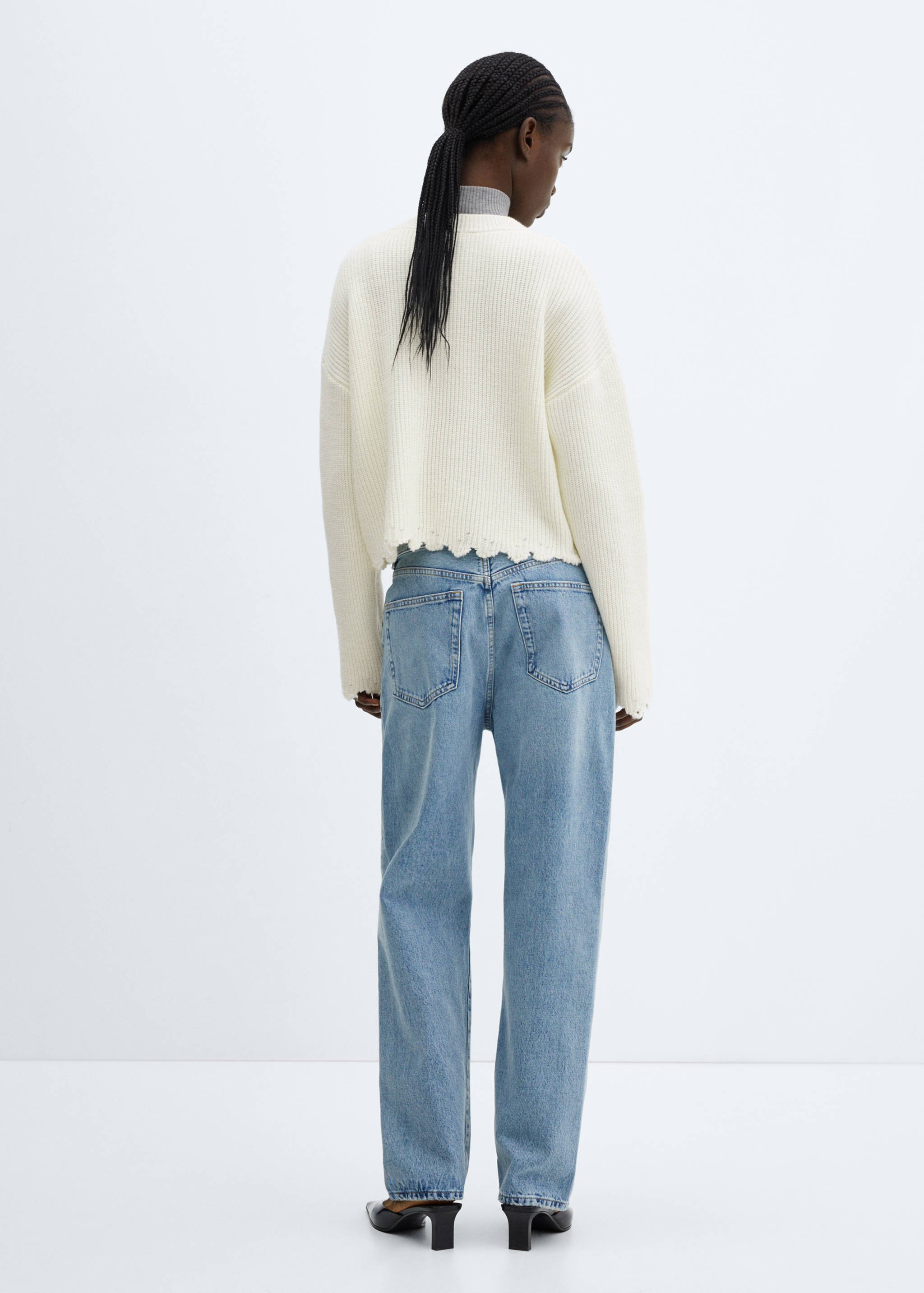 Round-neck knitted sweater - Reverse of the article