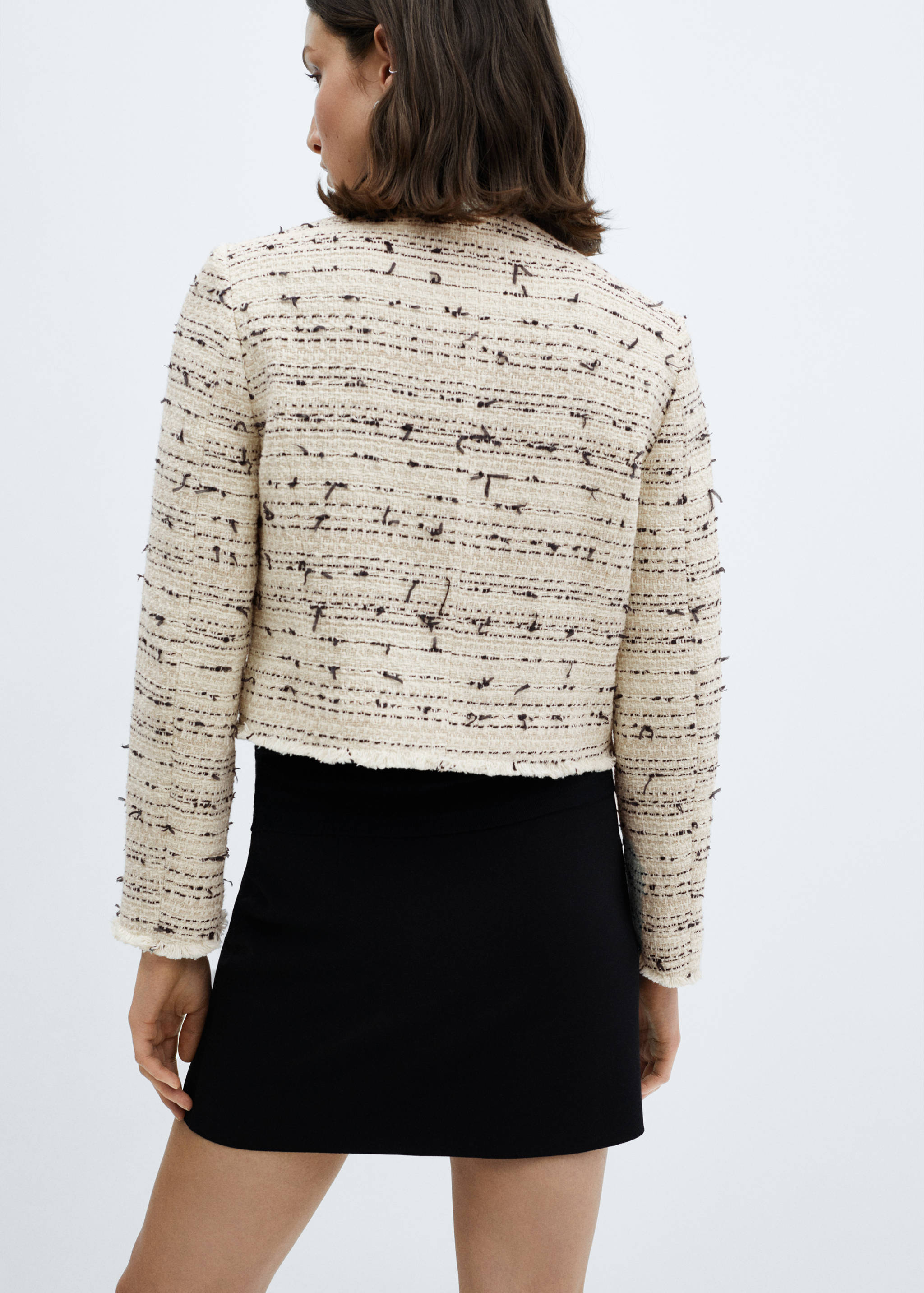 Tweed jacket with hook-and-eye fastenings - Reverse of the article