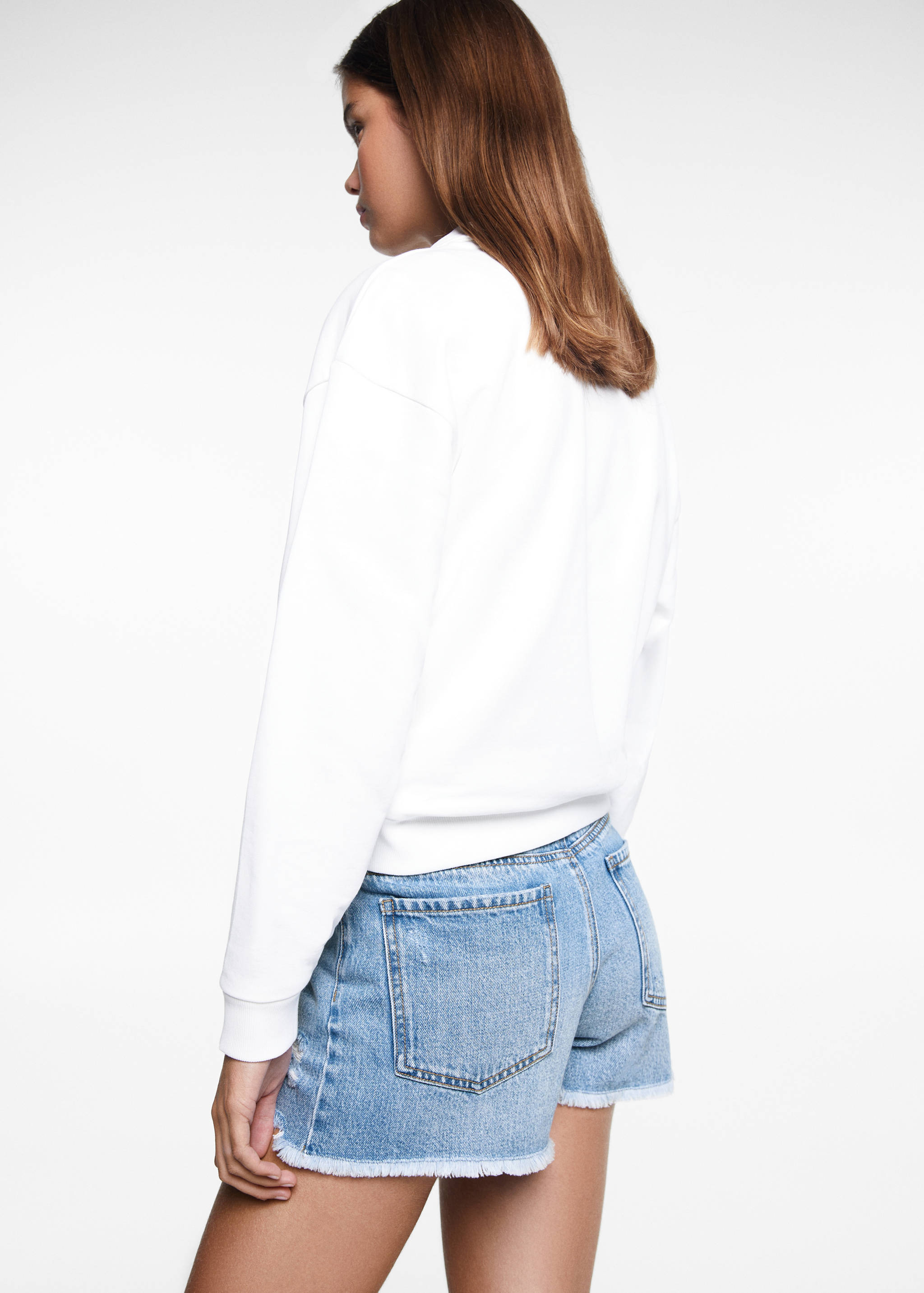 Shorts vaqueros rotos - Reverso del artículo