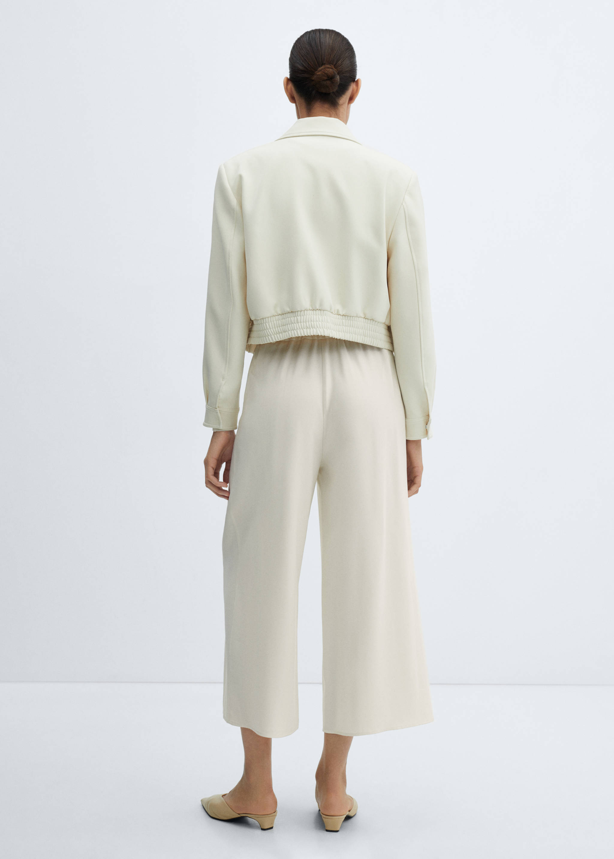 Pantalons wideleg cinturó - Revers de l'article