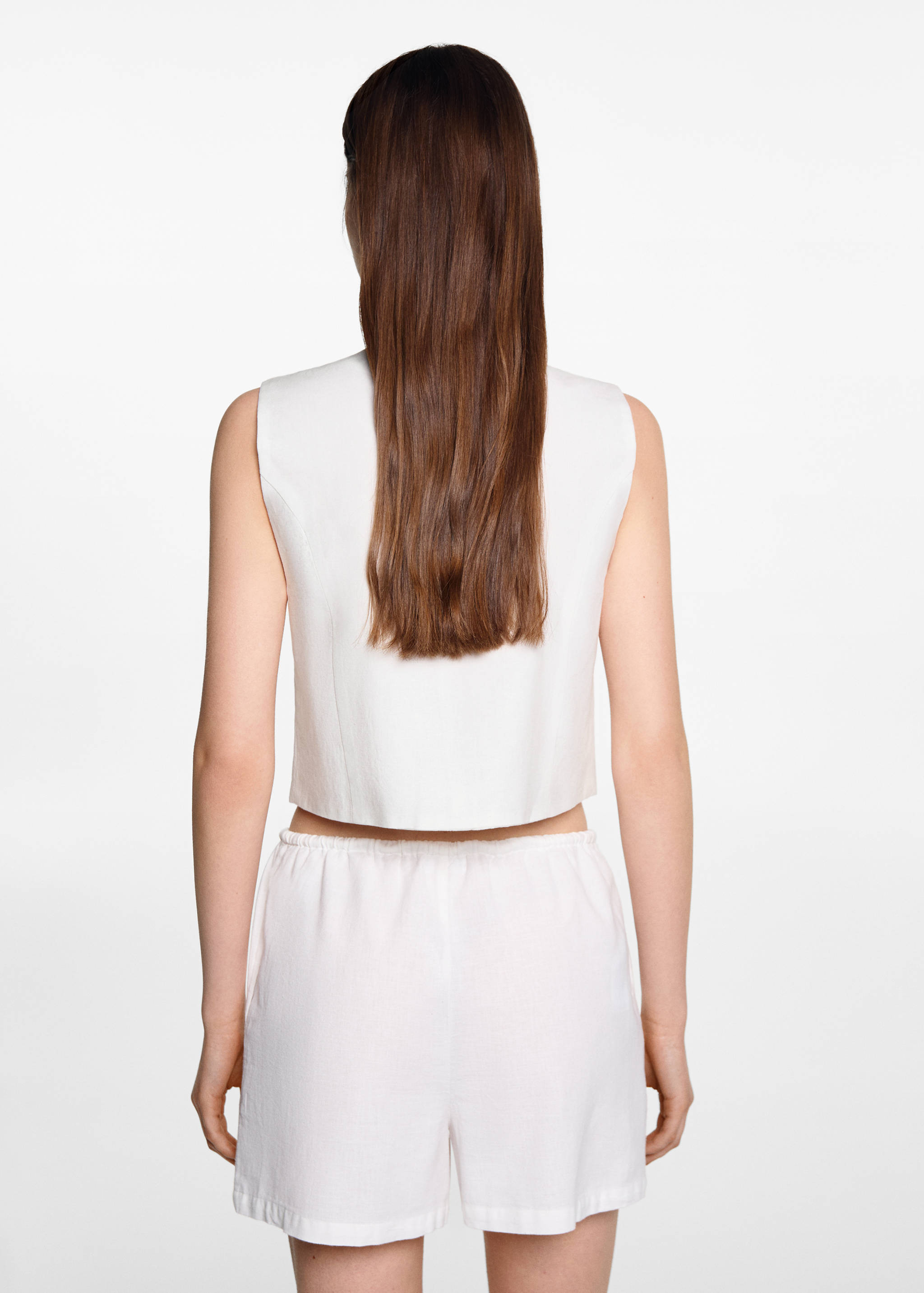 Linen vest with buttons - Reverse of the article