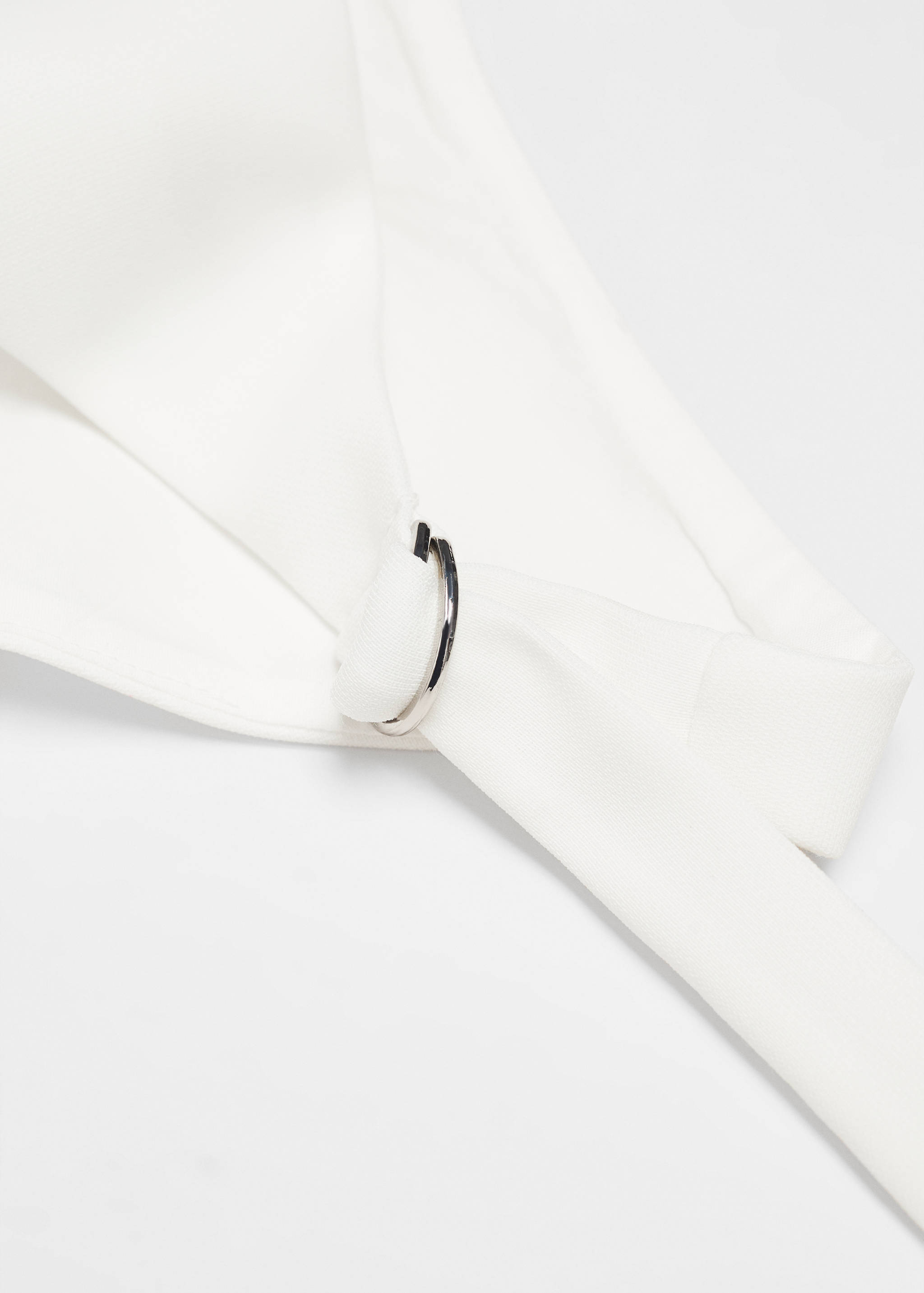 Gilet met knopen - Detail van het artikel 8