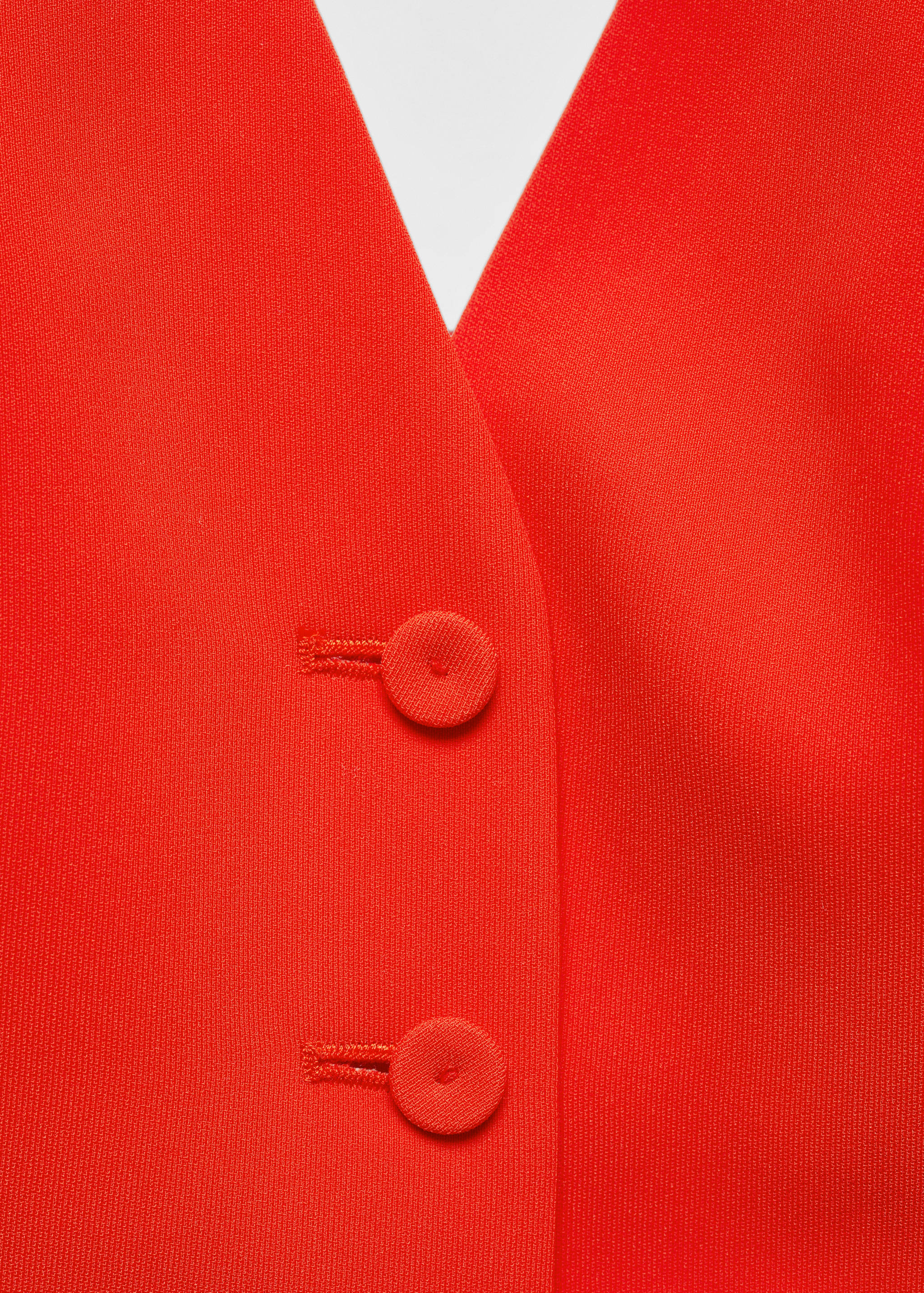 Gilet met knopen - Detail van het artikel 8