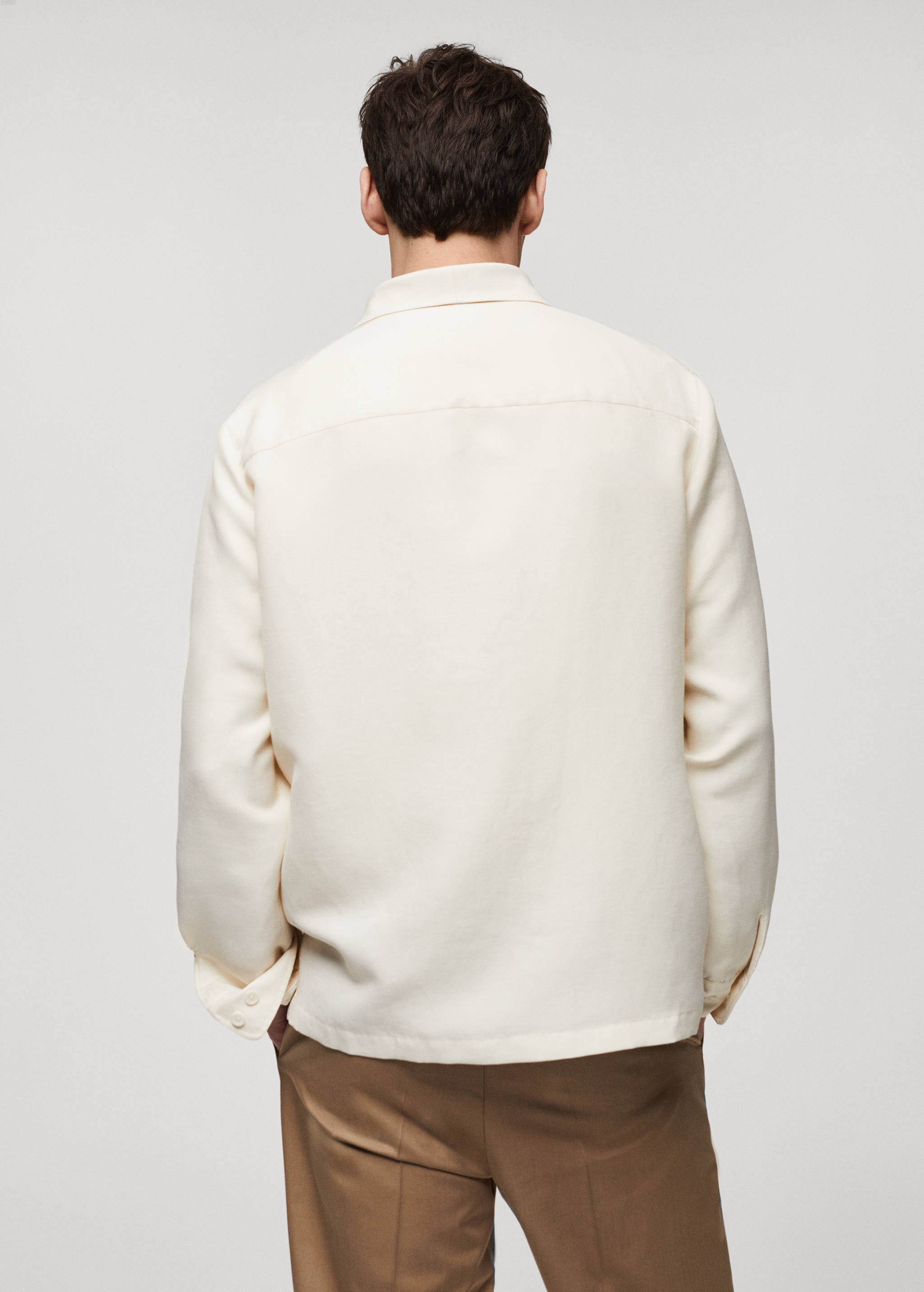 Sobrecamisa lli butxaques - Revers de l'article