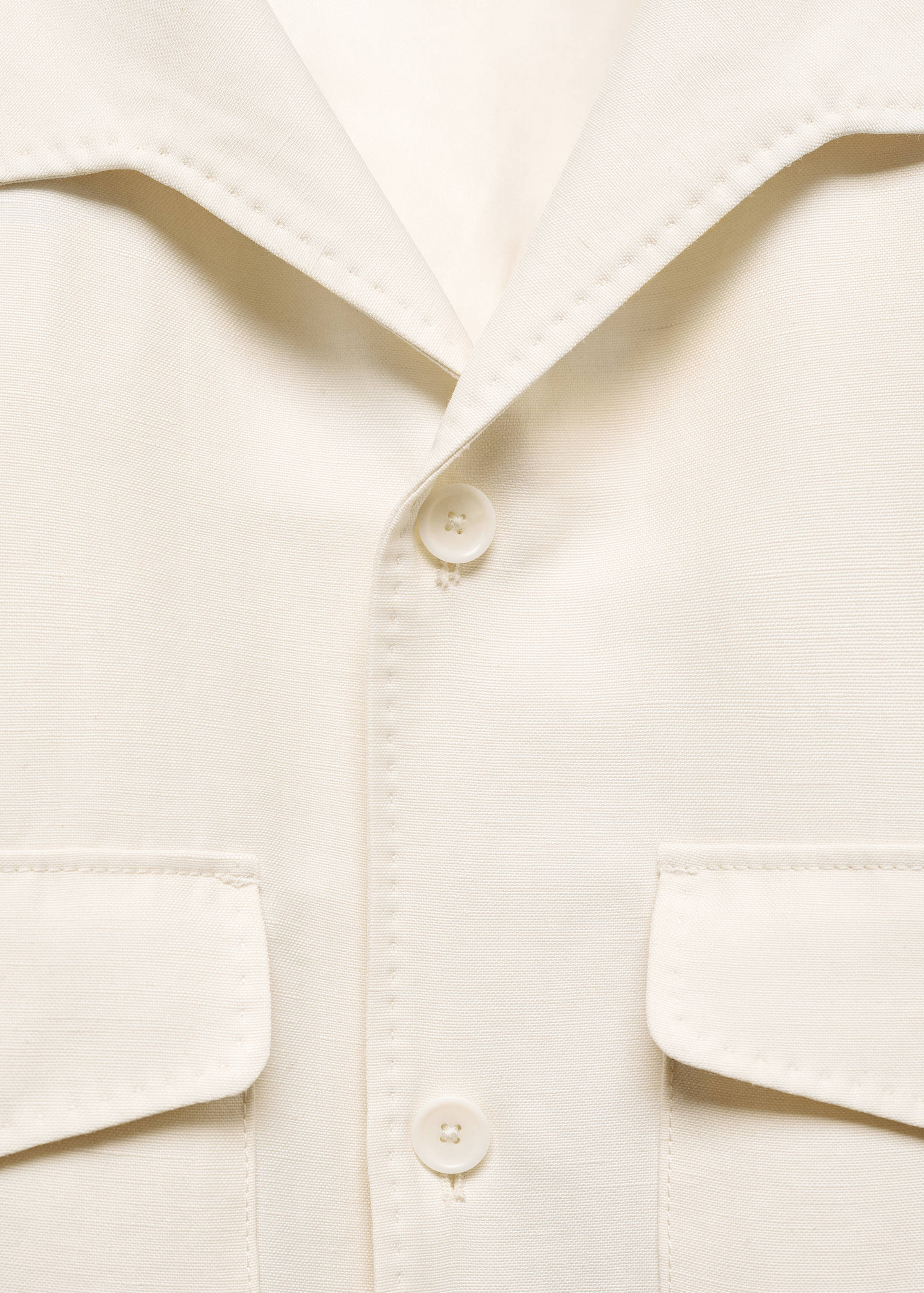 Sobrecamisa lli butxaques - Detall de l'article 8