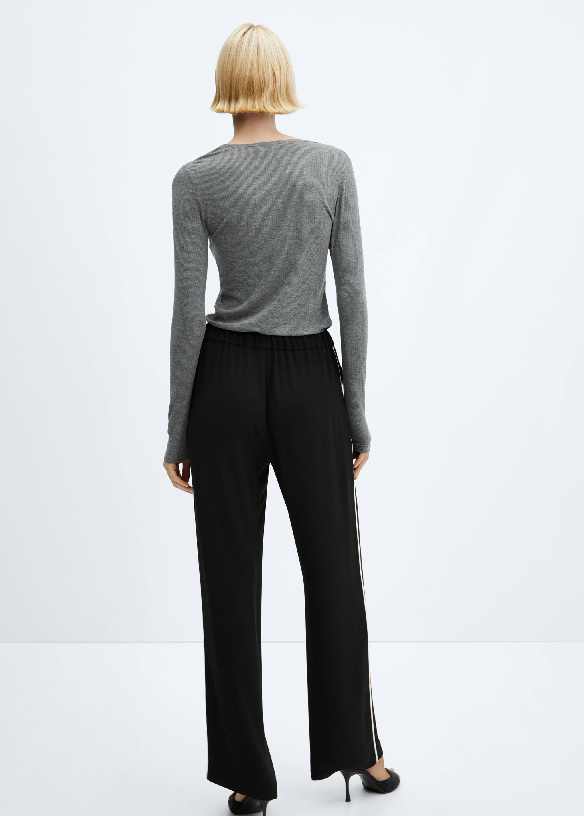 Elastic waist pants - Reverse of the article