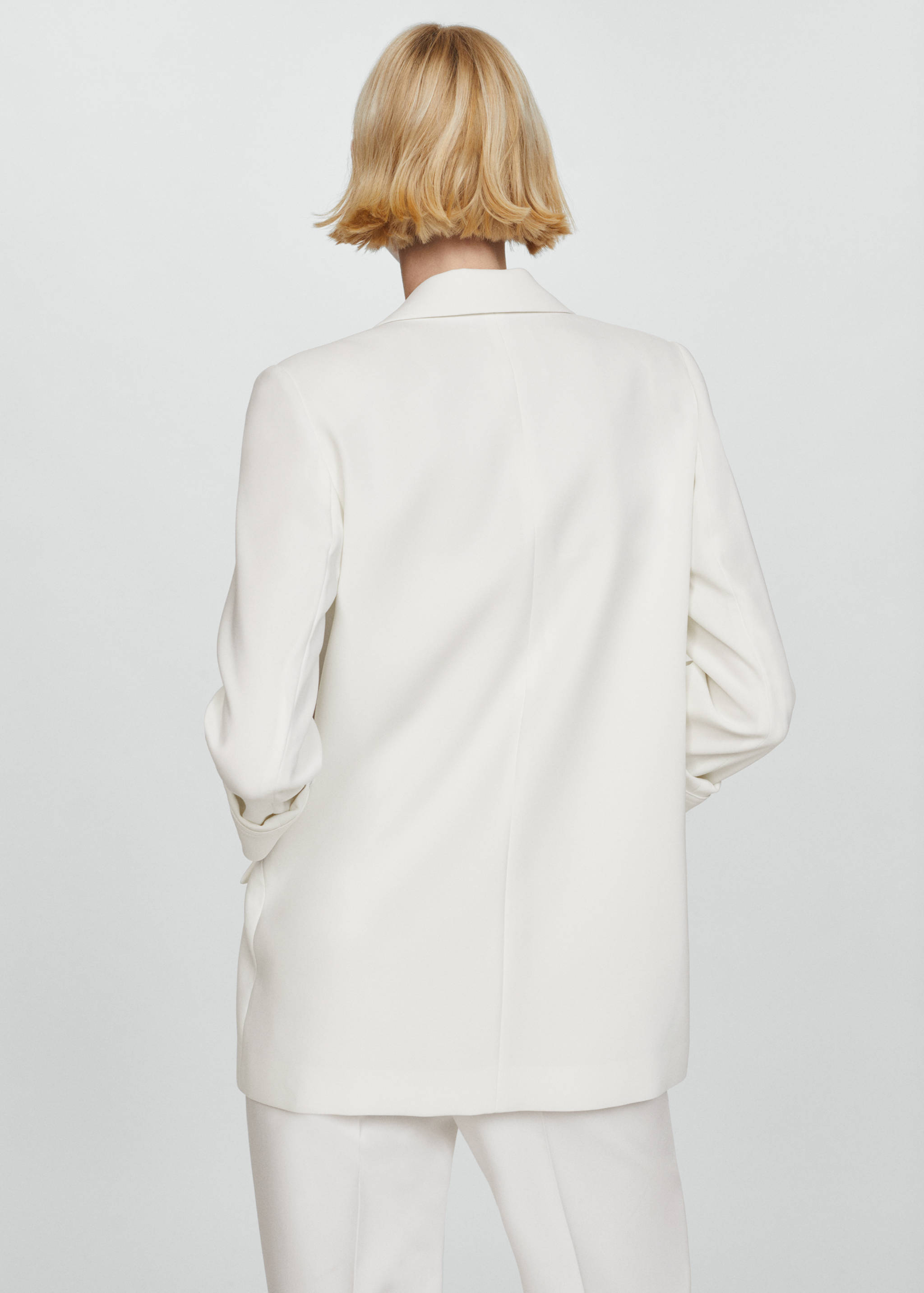 Tailored jacket with turn-down sleeves - Reverse of the article
