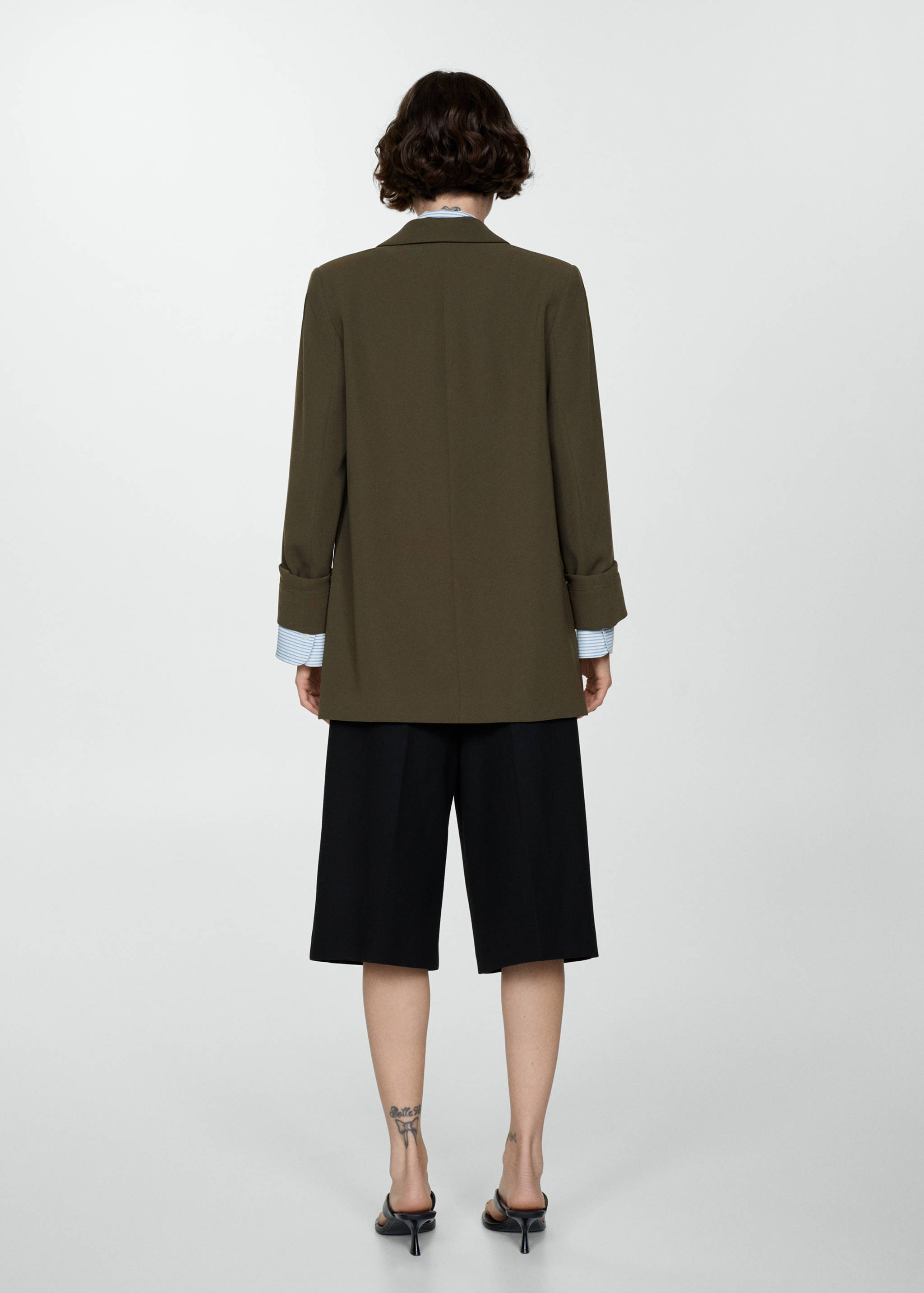 Tailored jacket with turn-down sleeves - Reverse of the article