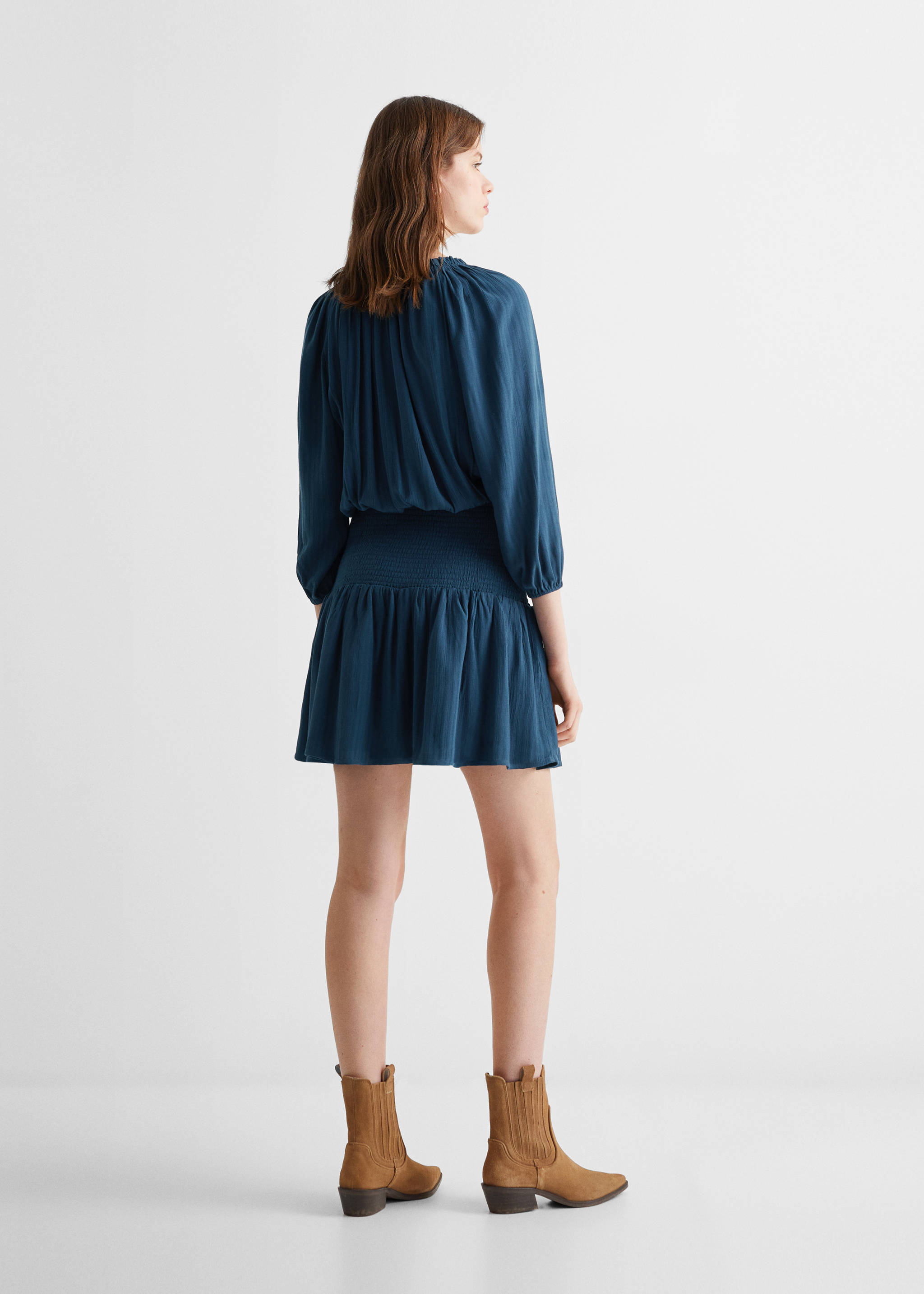 Ruffled dress - Reverse of the article