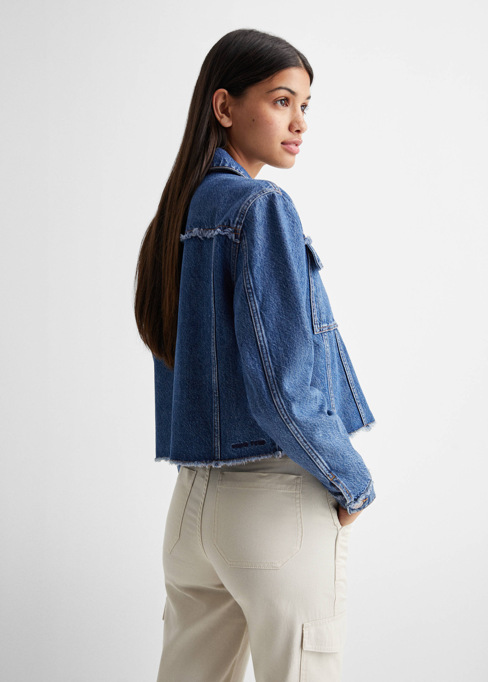 Pocketed denim jacket - Reverse of the article