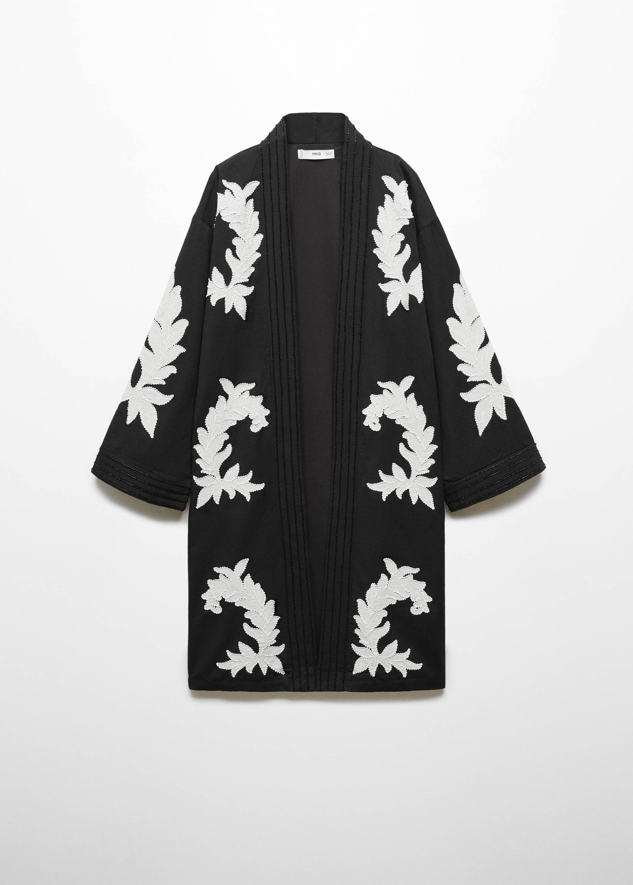 Caftan brodé à fleurs - Article sans modèle