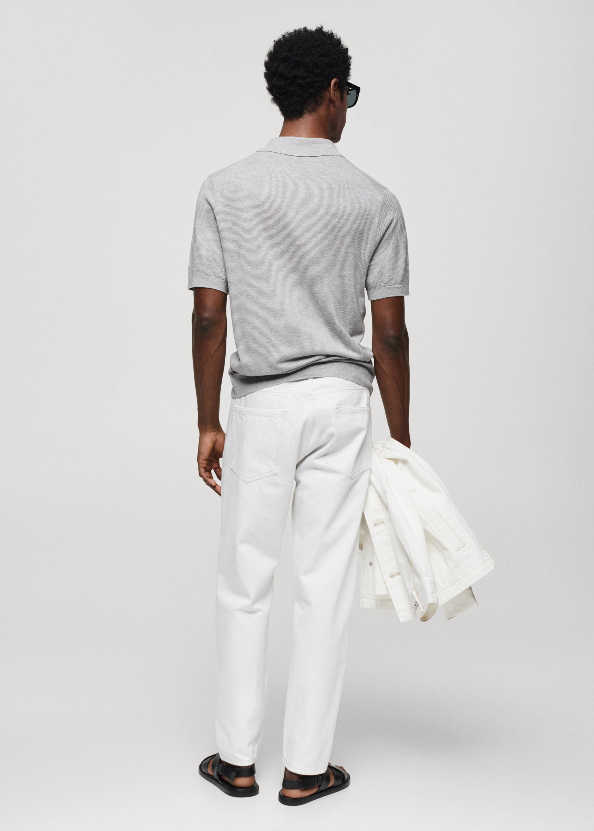 Buttoned micro-structure knitted polo shirt - Reverse of the article