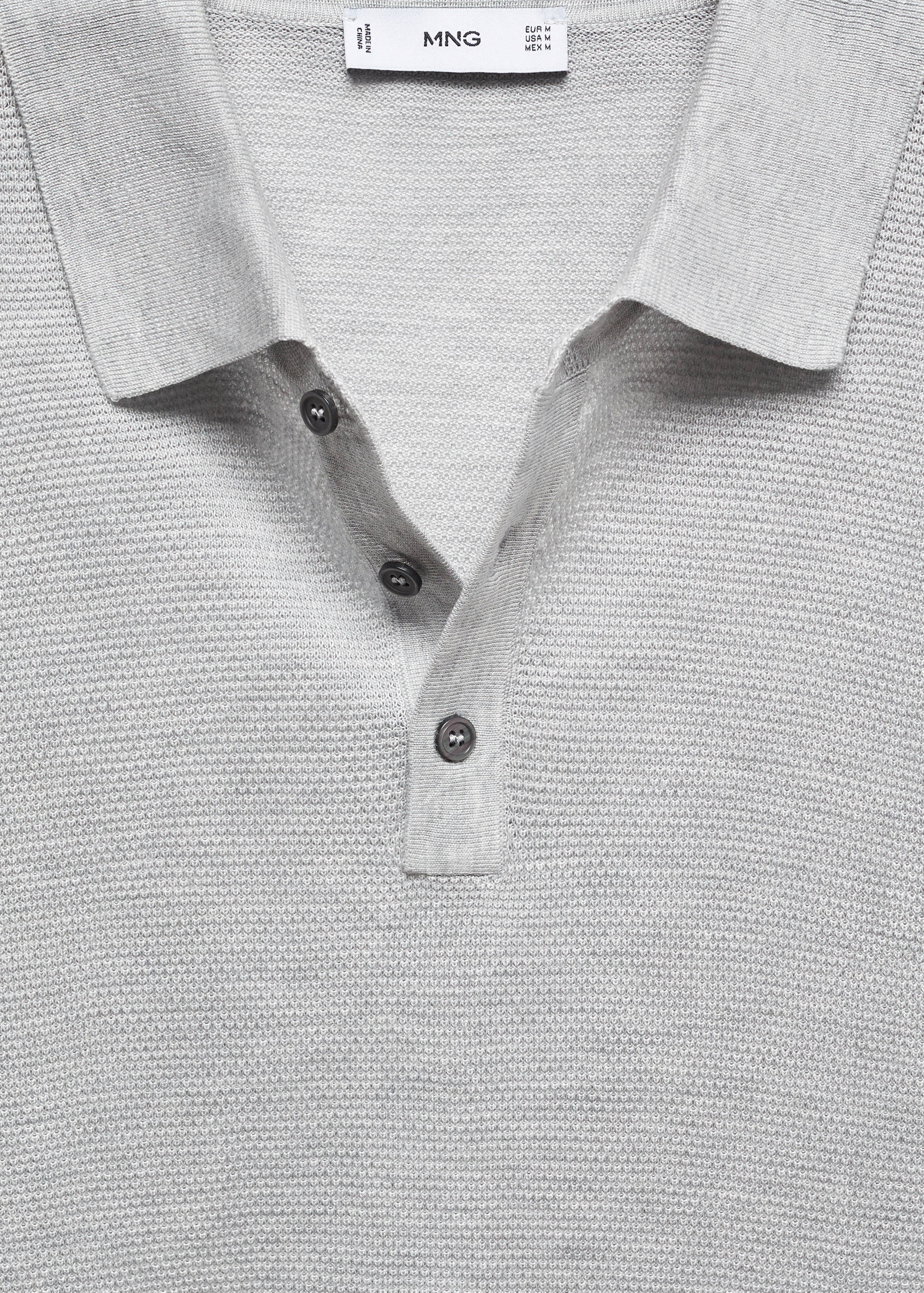 Buttoned micro-structure knitted polo shirt - Details of the article 8