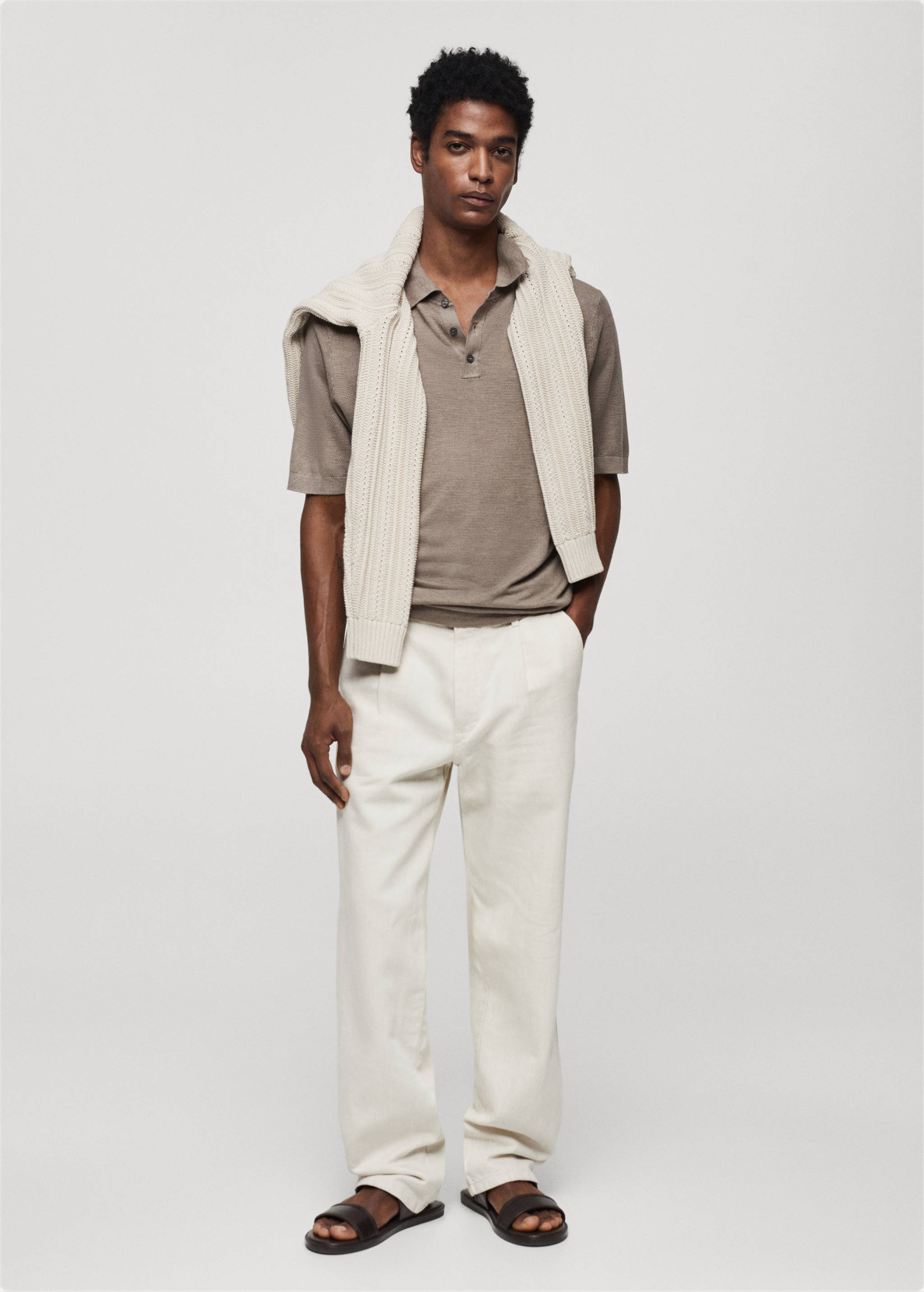 Buttoned micro-structure knitted polo shirt - General plane