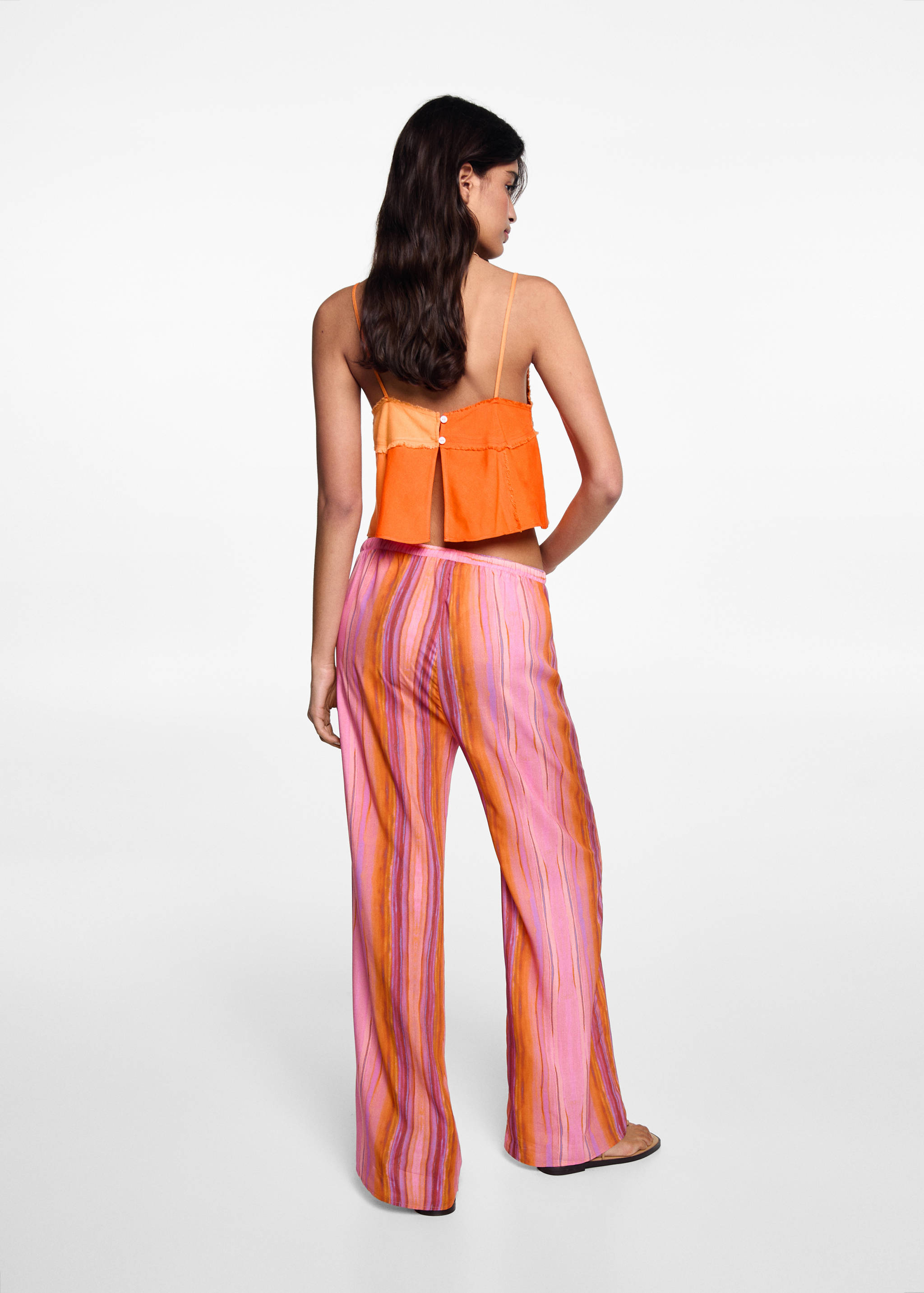 Multi-coloured striped pants - Reverse of the article