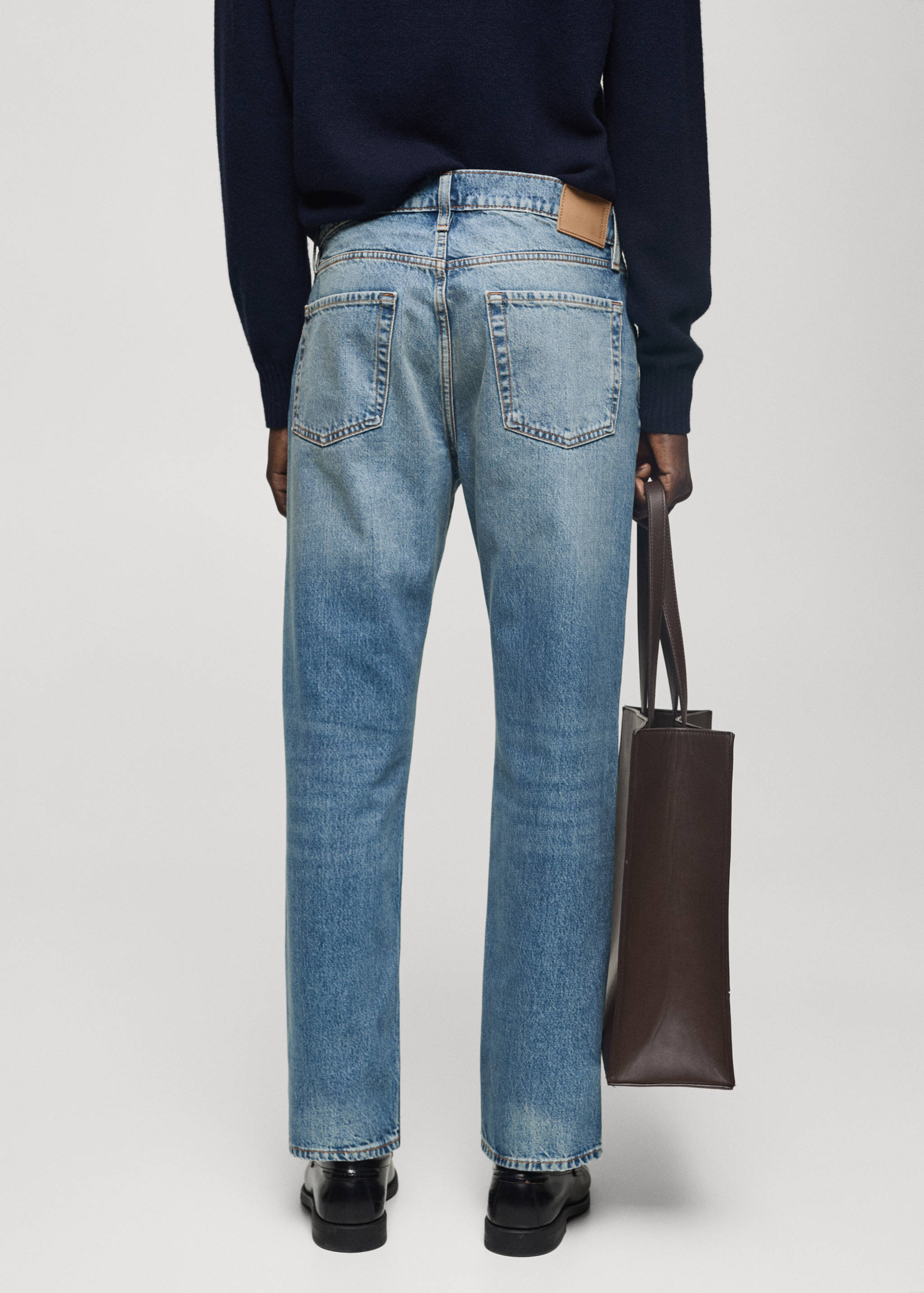 Ripped straight-fit light-wash jeans - Reverse of the article