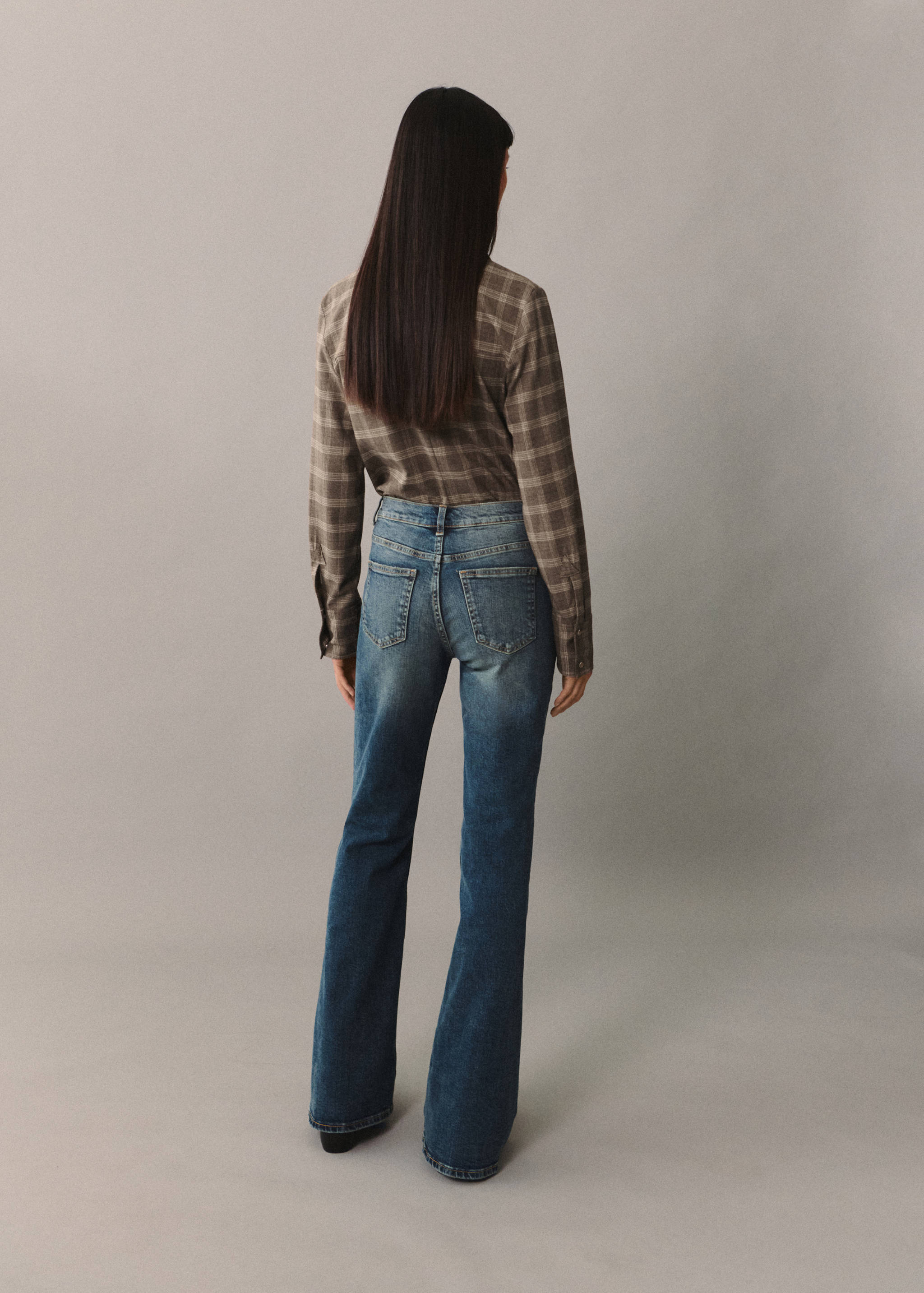 High-waist flared jeans - Reverse of the article