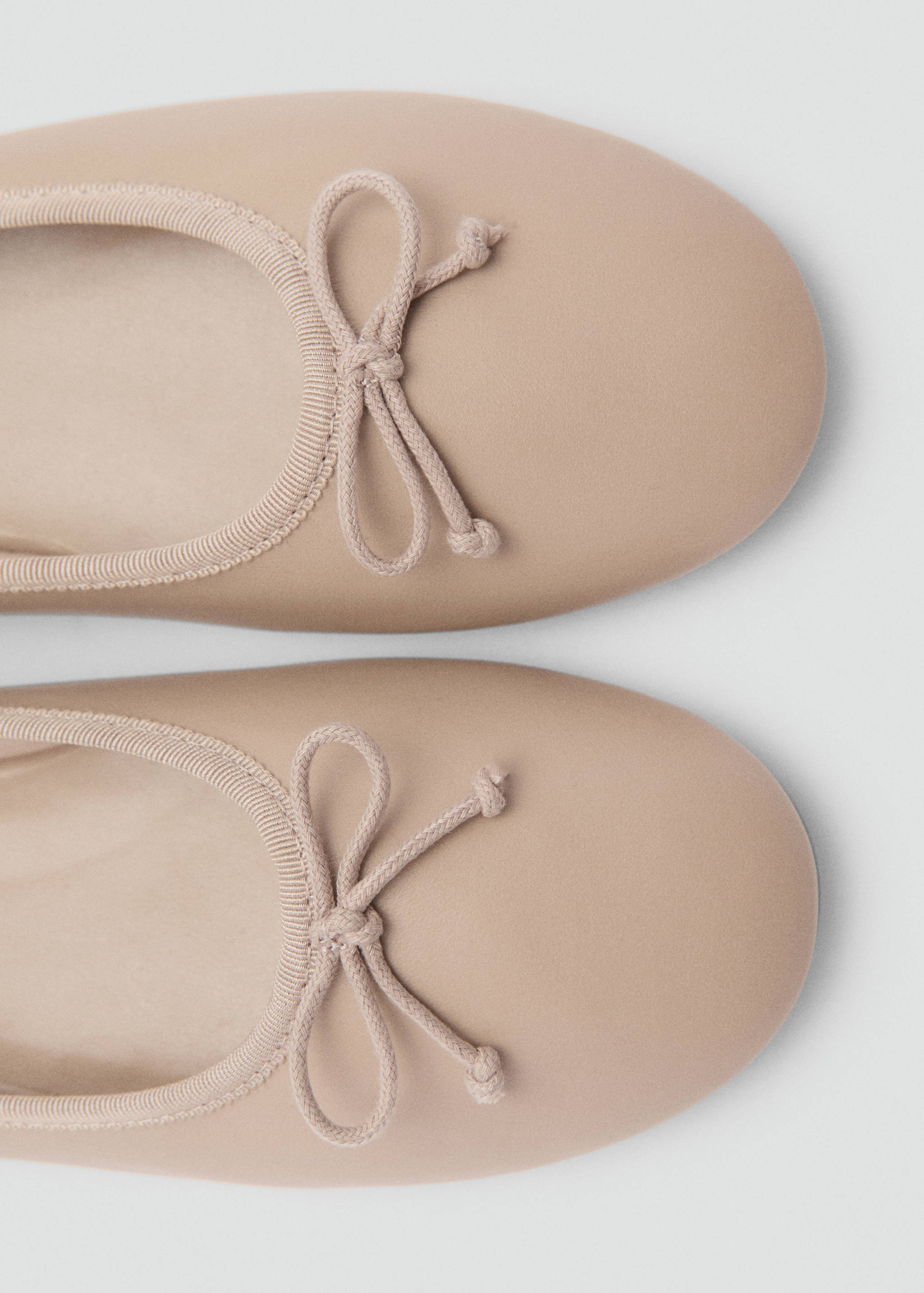 Sabrina de pele com laço - Pormenor do artigo 3