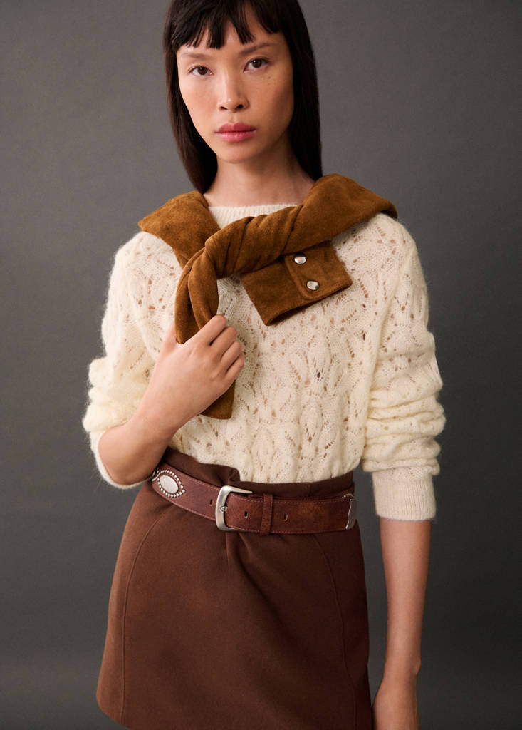 Knitted sweater with lace accents
