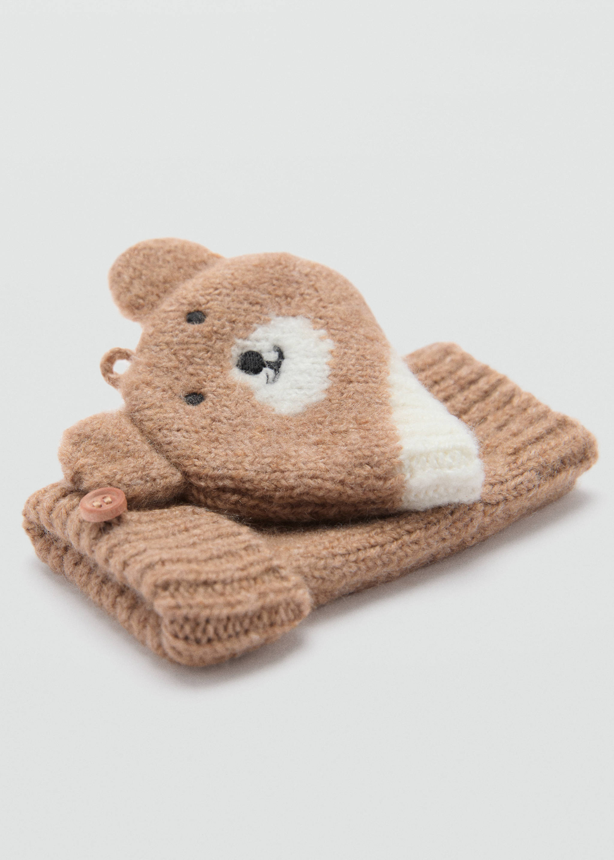 Guantes punto oso - Plano medio