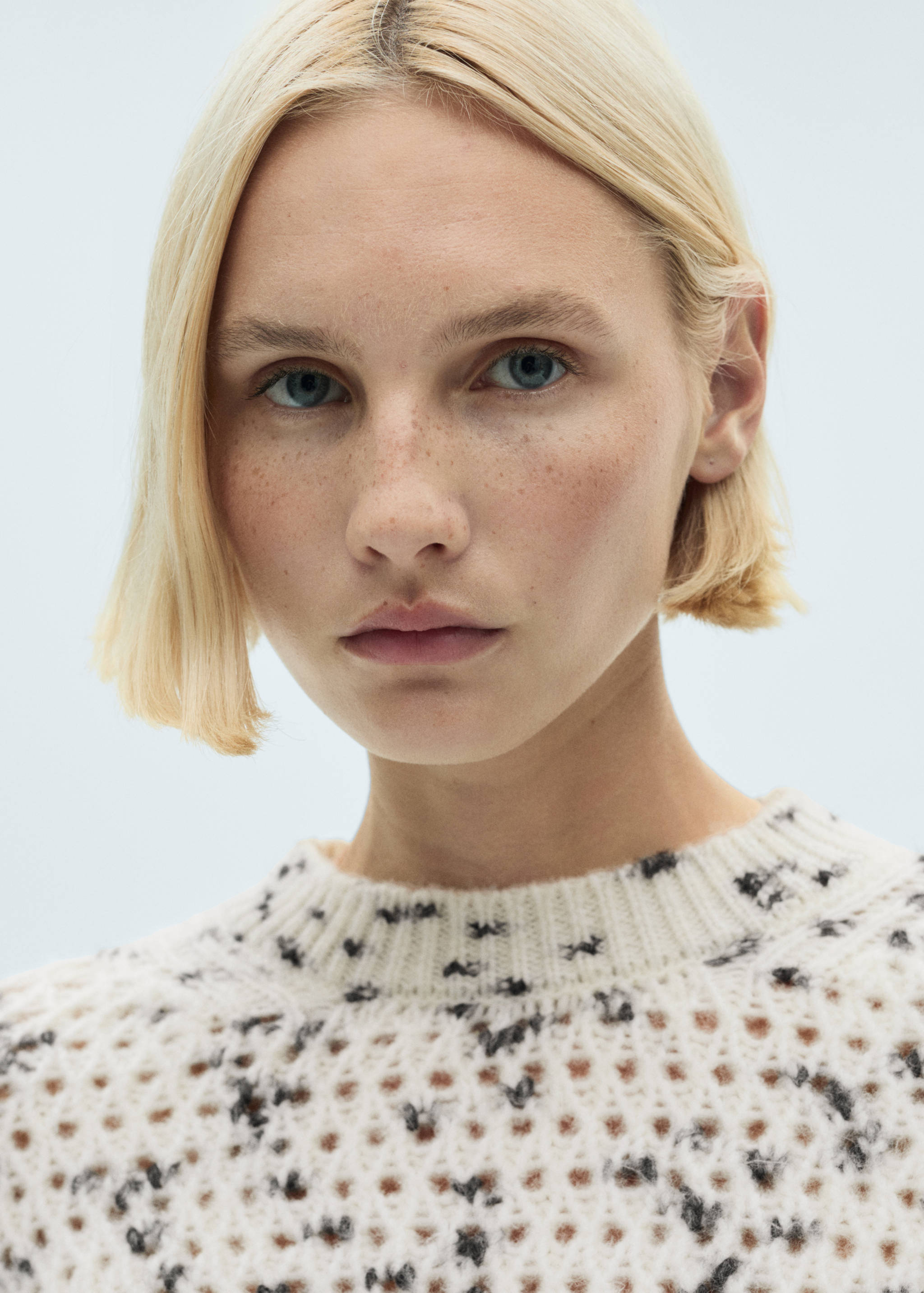 Melierter Lochstrickpullover - Detail des Artikels 1