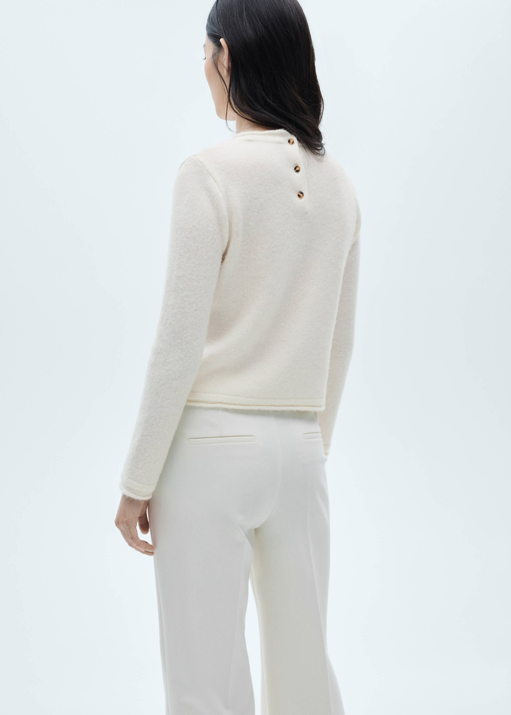 Round-neck sweater with buttons - Reverse of the article
