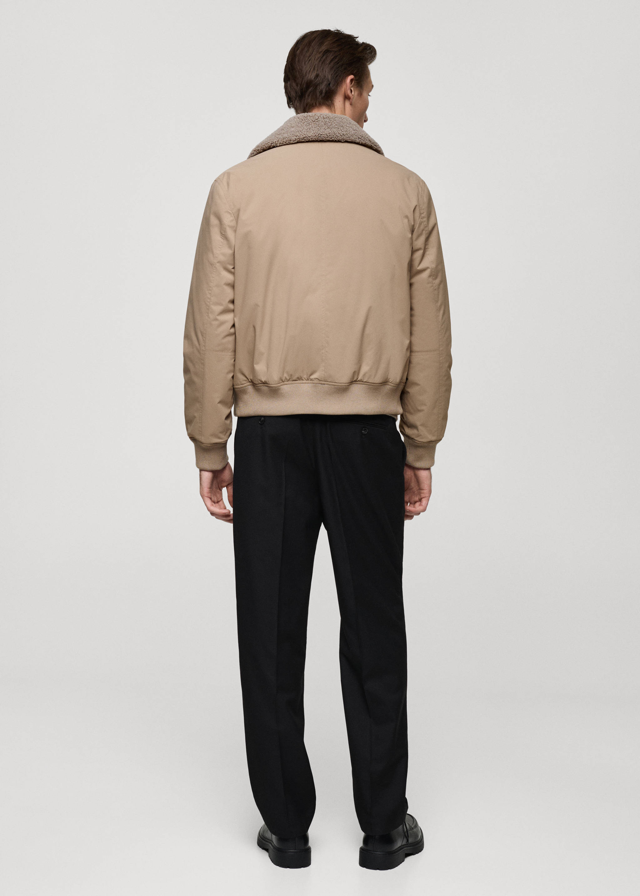 Water-repellent jacket with sheepskin collar - Reverse of the article