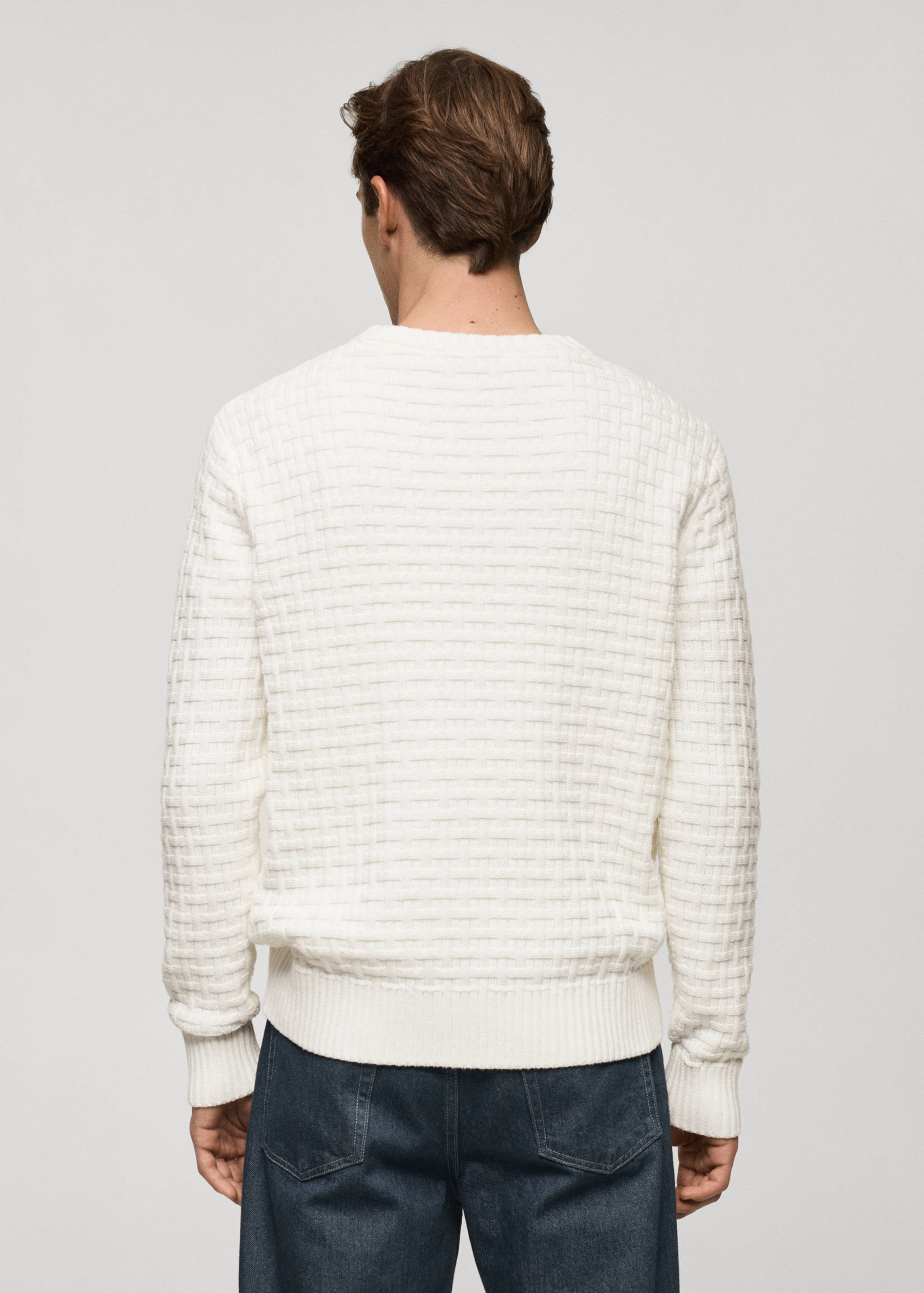 Crossed knit sweater - Reverse of the article