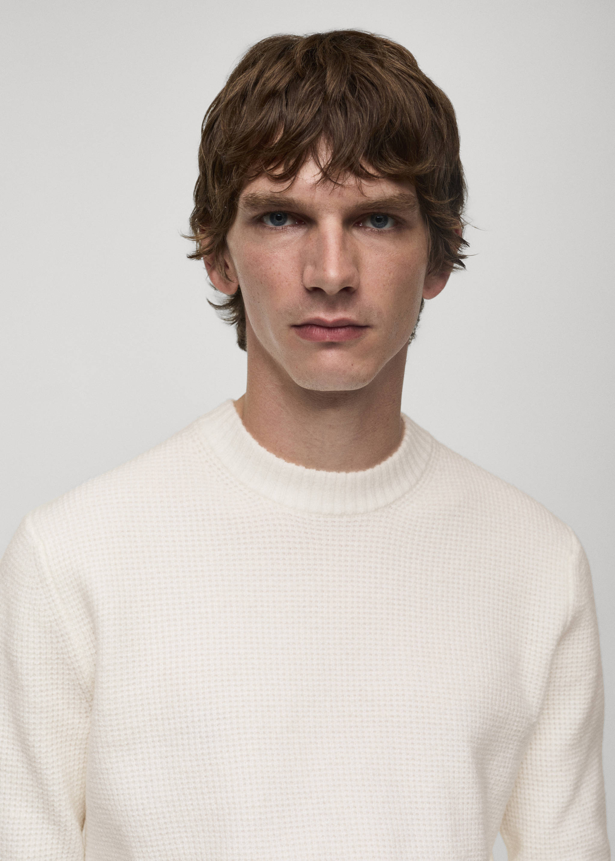 Knitted sweater with check structure - Details of the article 1