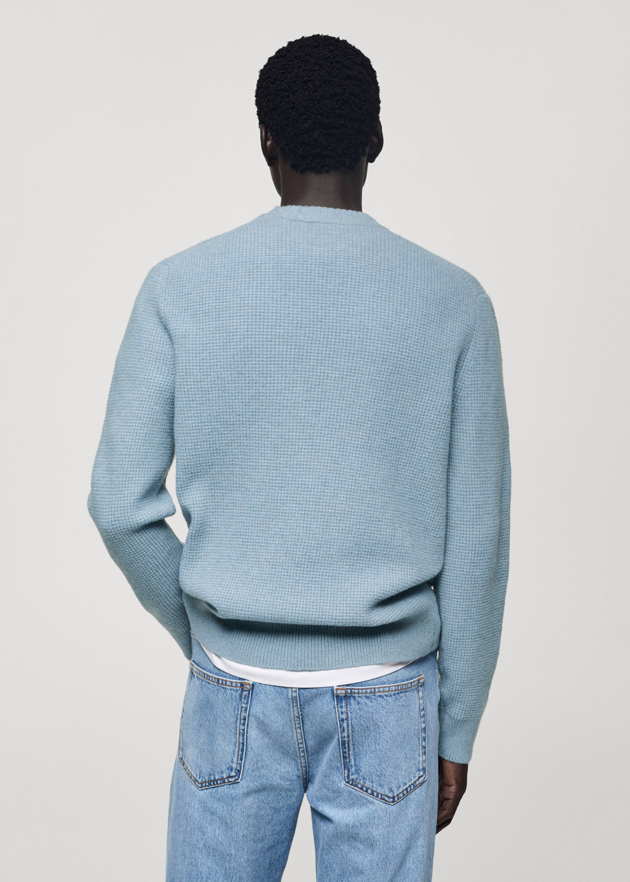 Knitted sweater with check structure - Reverse of the article