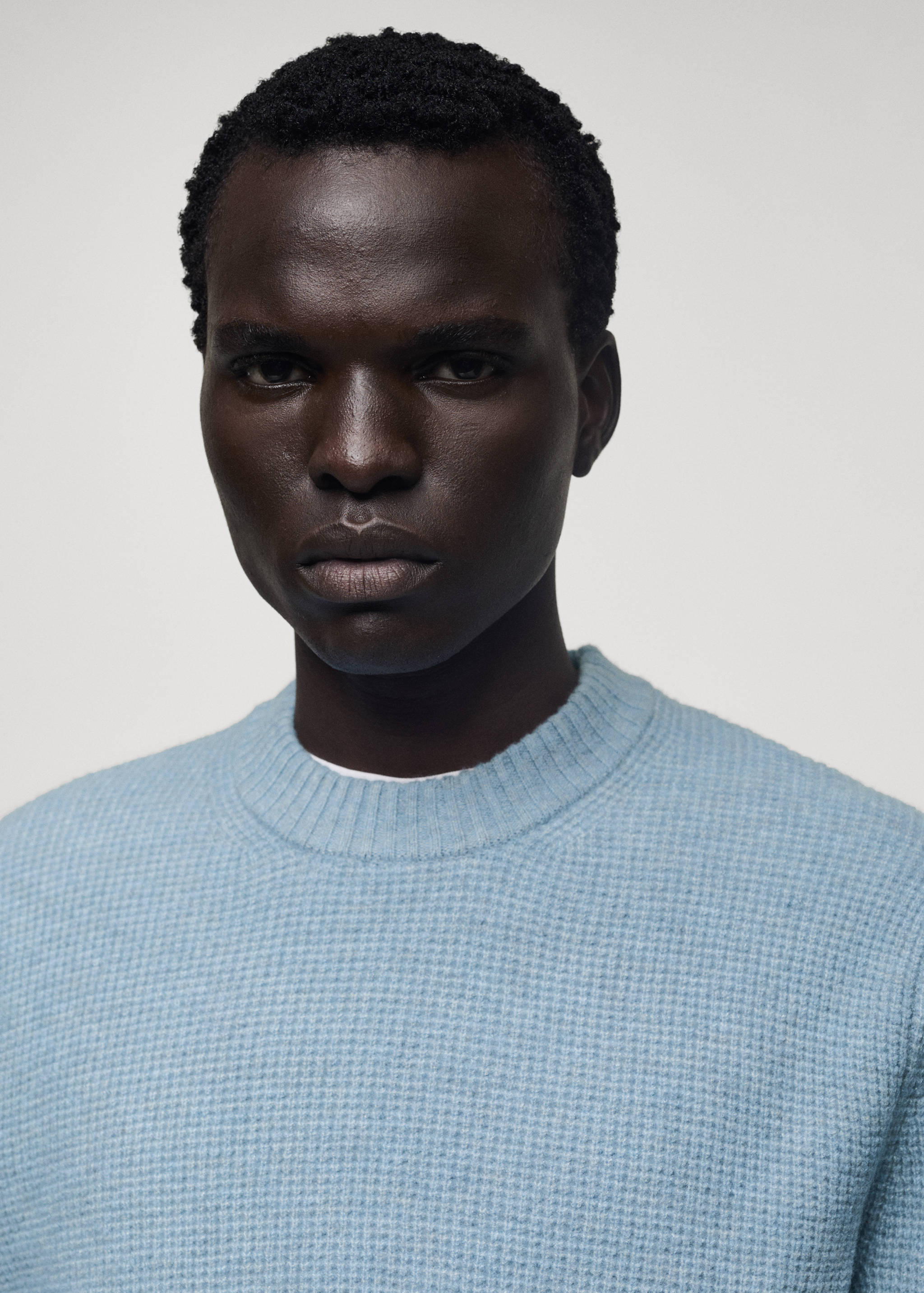 Knitted sweater with check structure - Details of the article 1