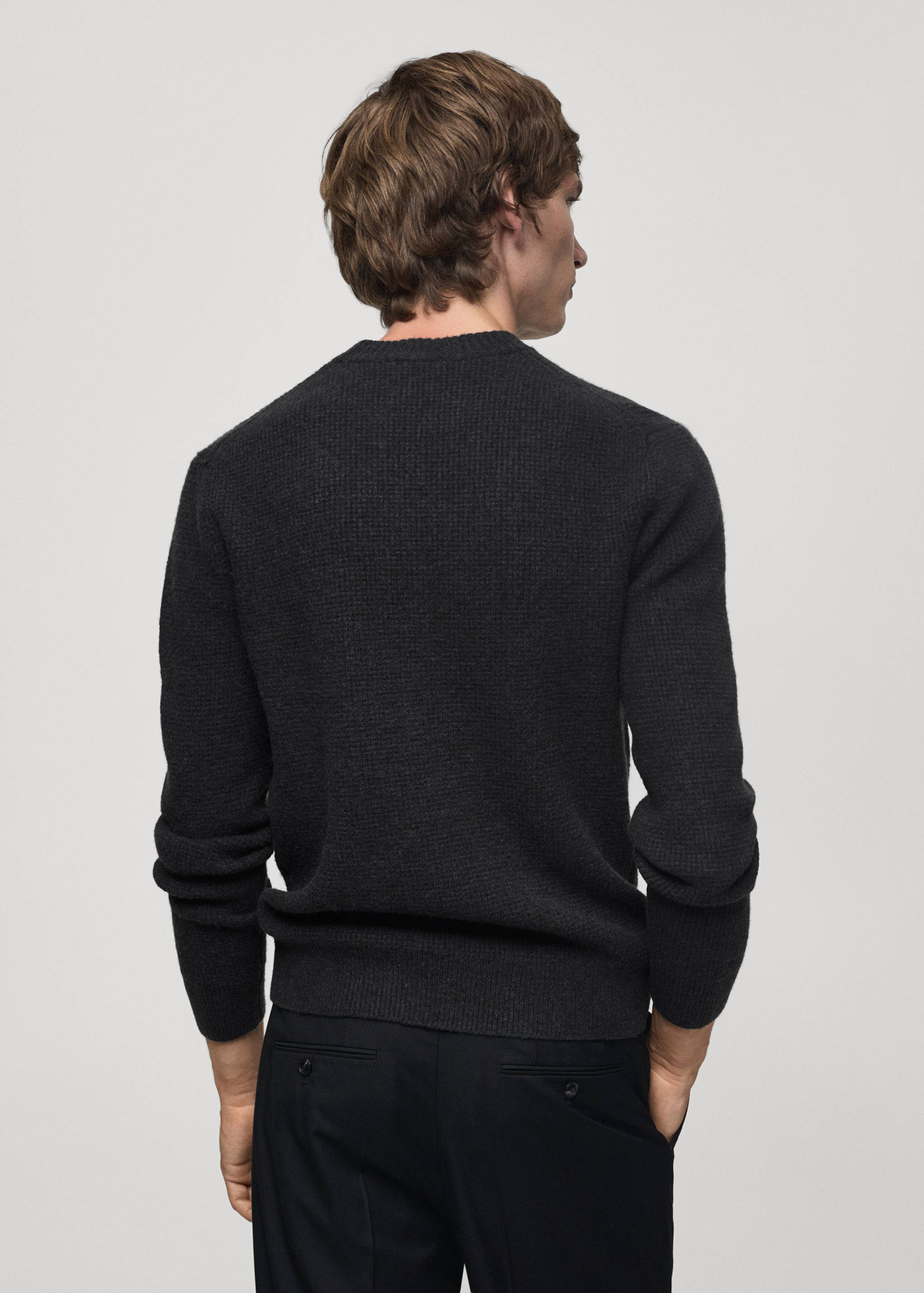 Knitted sweater with check structure - Reverse of the article
